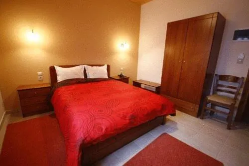 Bed in Hotel Ilianna