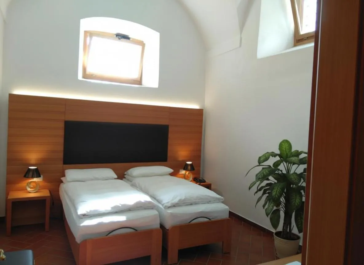 Bed in Relais Palazzo Lodron