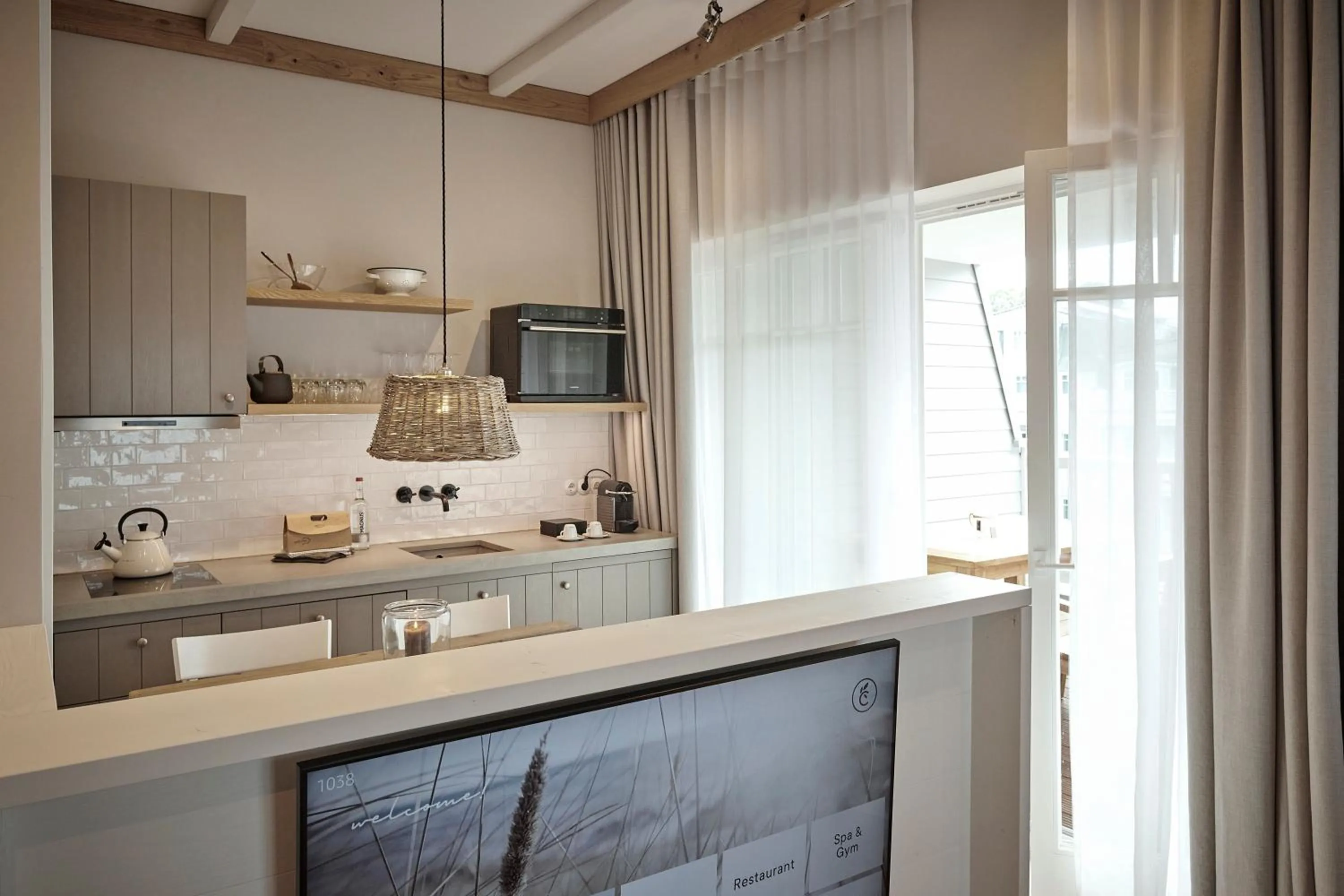 Kitchen or kitchenette in The Cozy Hotel & Lofts Timmendorfer Strand