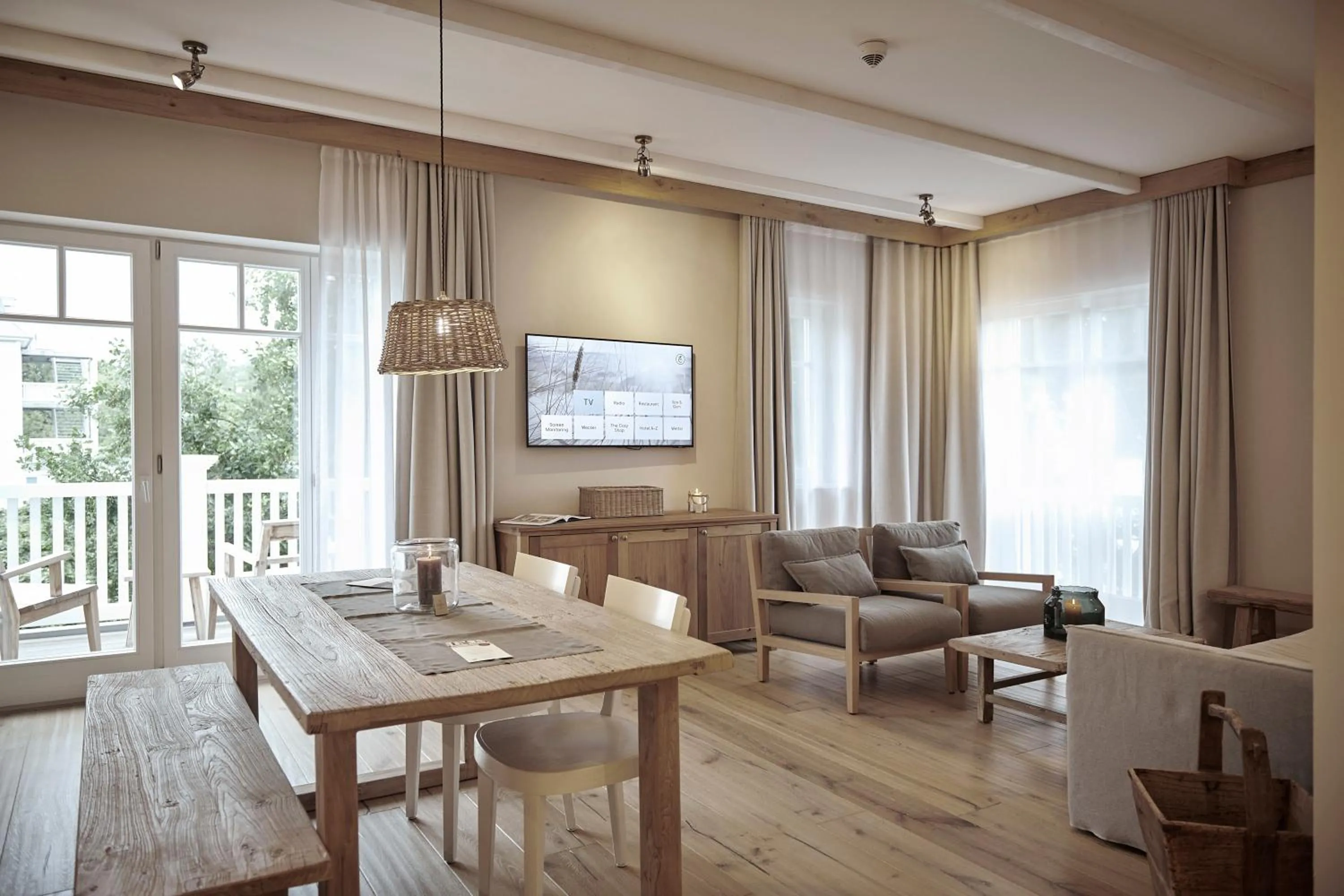 TV and multimedia in The Cozy Hotel & Lofts Timmendorfer Strand