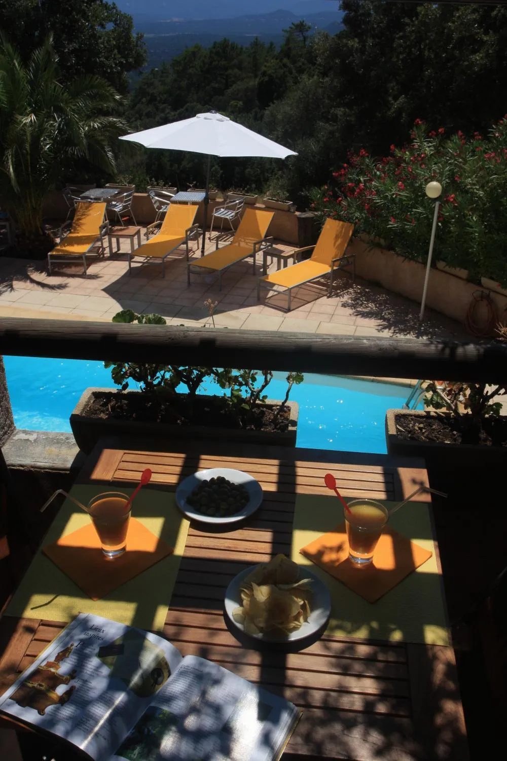 Balcony/Terrace in Bungalows Du Maquis
