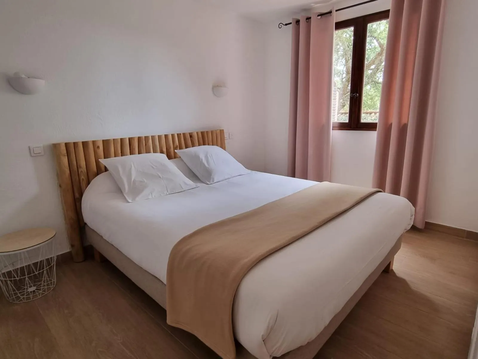 Bed in Bungalows Du Maquis