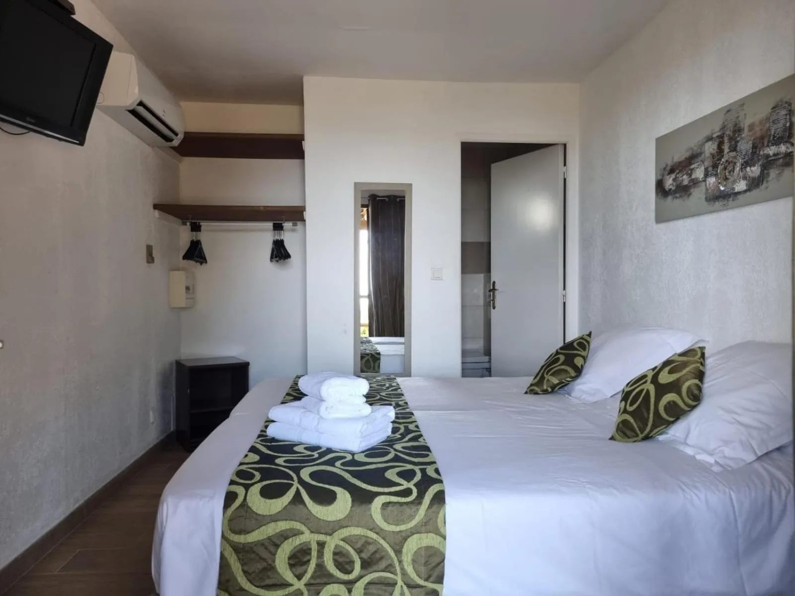 Bed in Bungalows Du Maquis