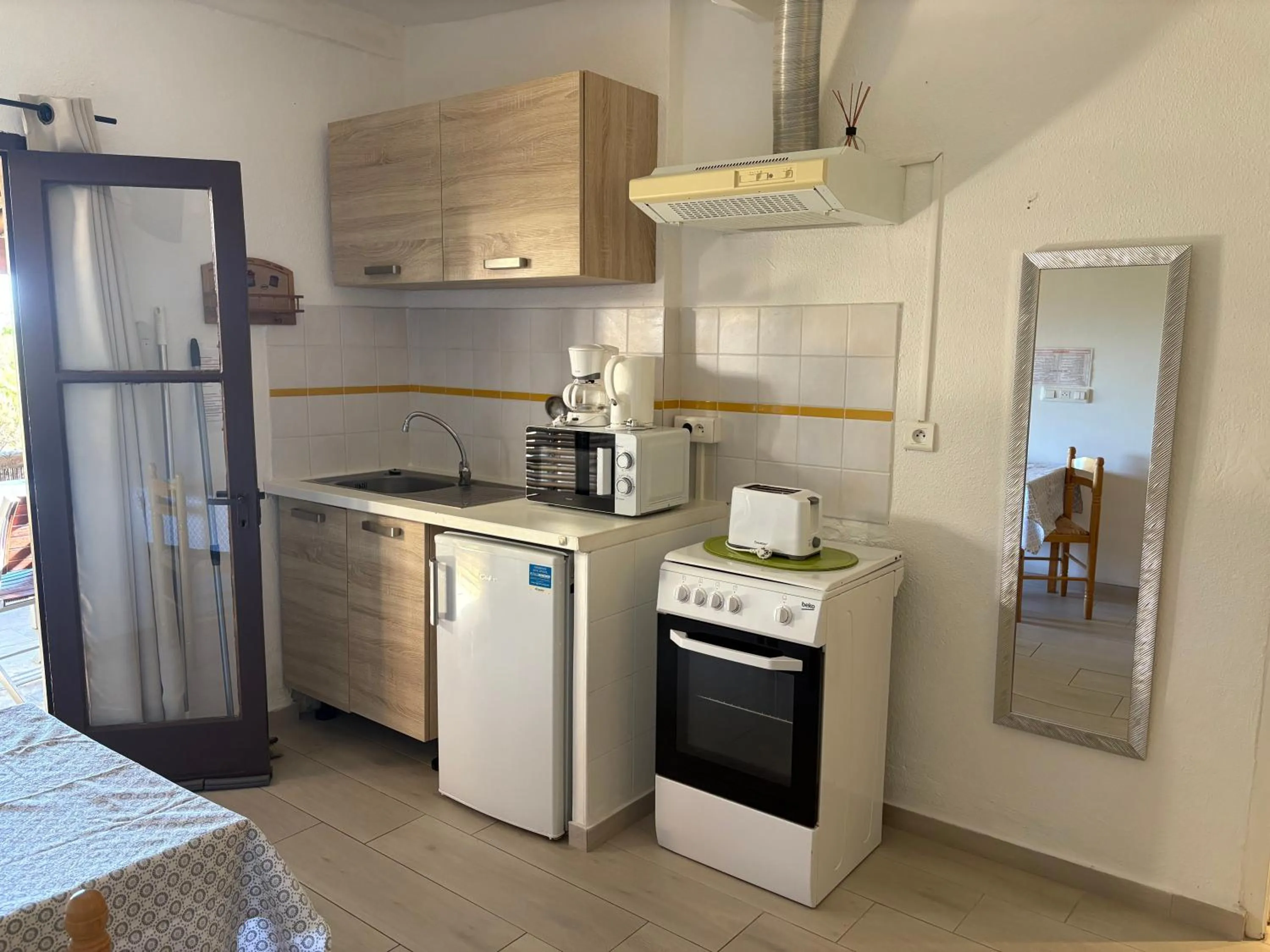 Kitchen or kitchenette in Bungalows Du Maquis