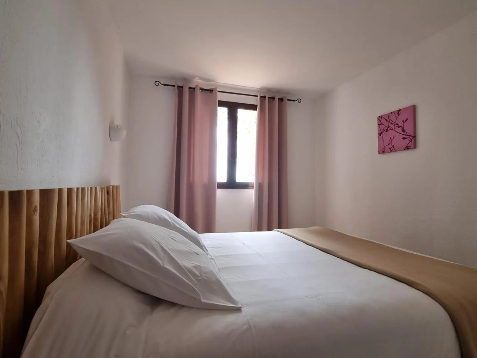 Bed in Bungalows Du Maquis