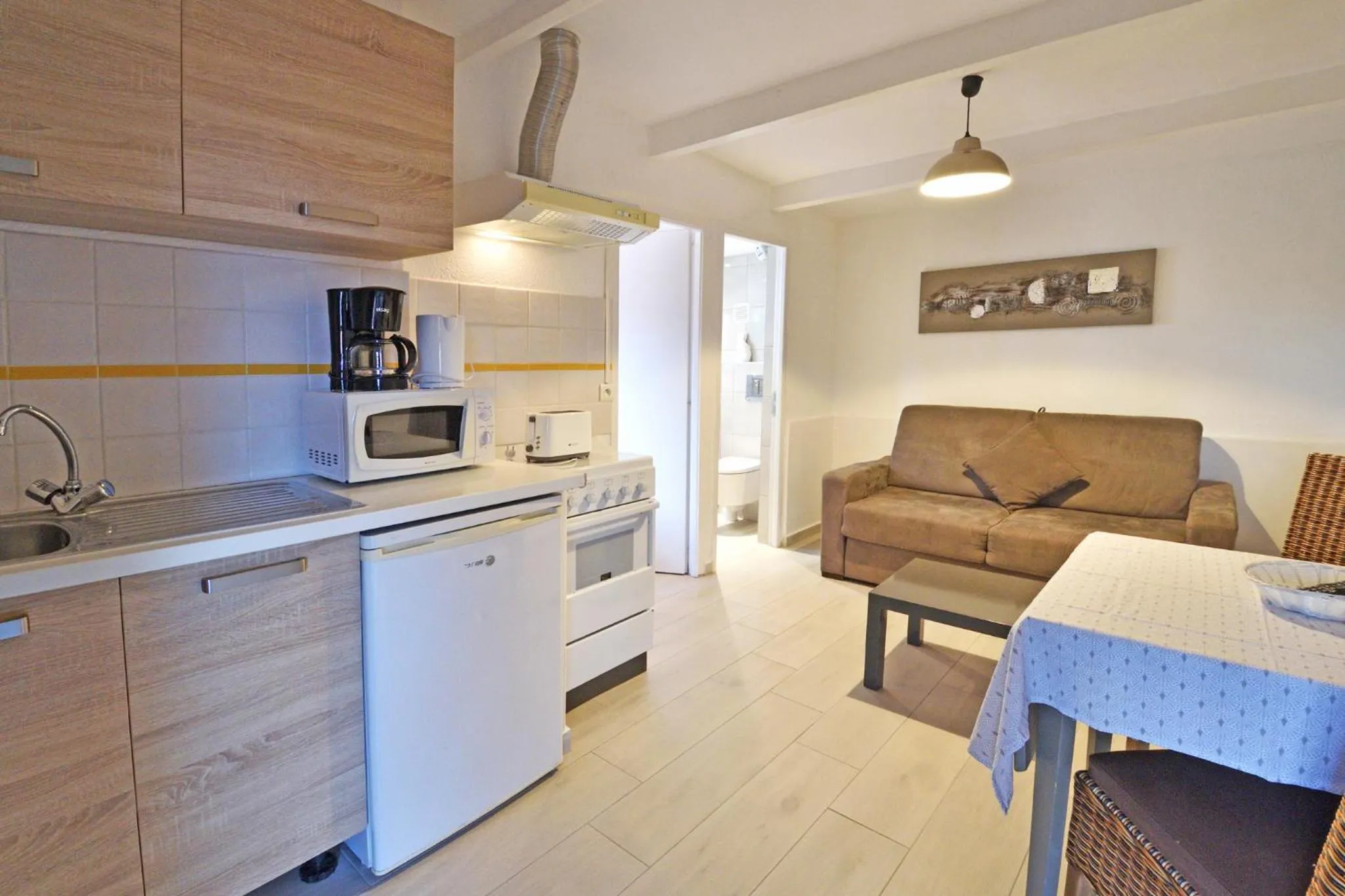 Kitchen or kitchenette in Bungalows Du Maquis