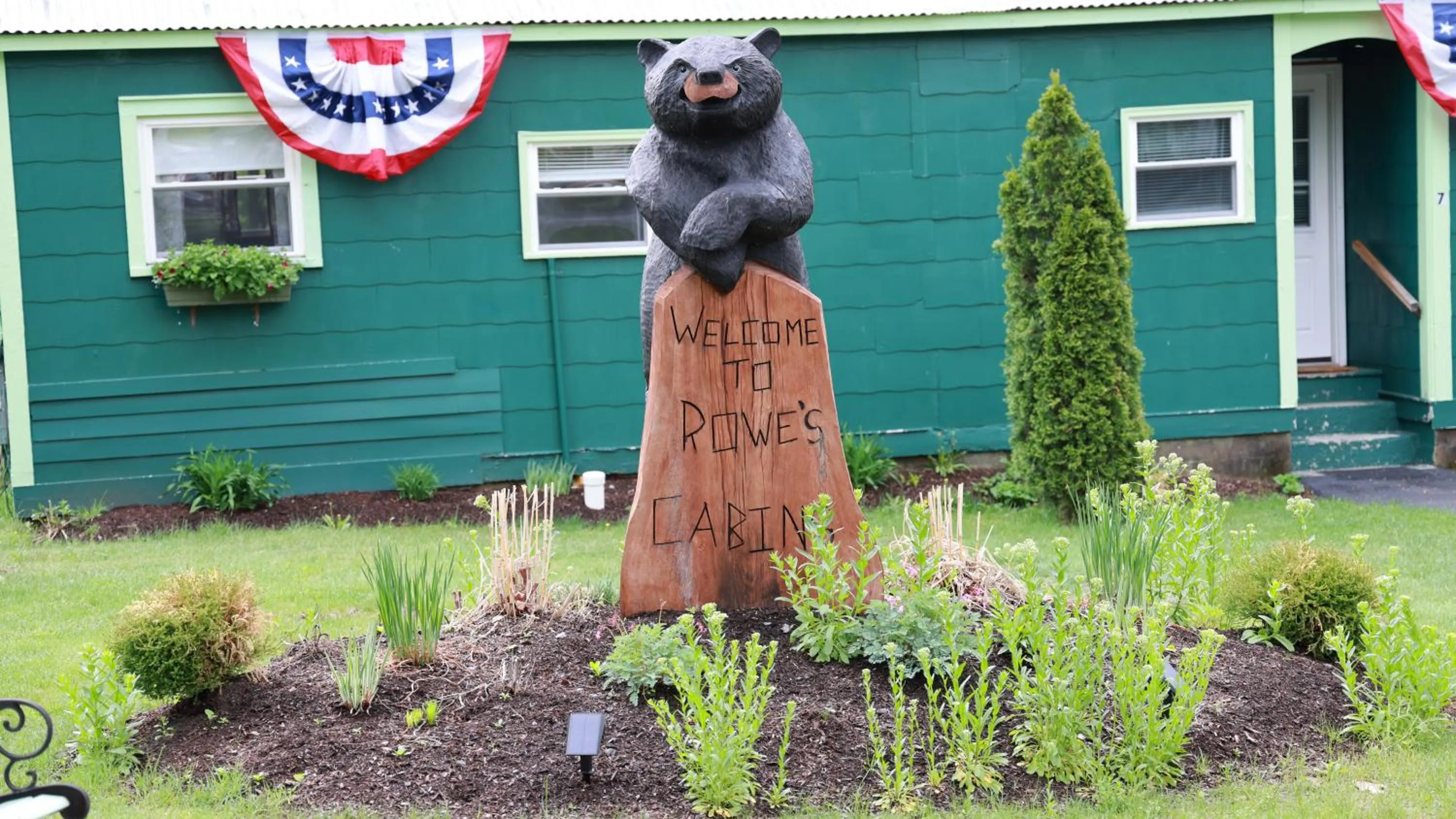 Garden view in Rowe's Adirondack Cabins of Schroon Lake