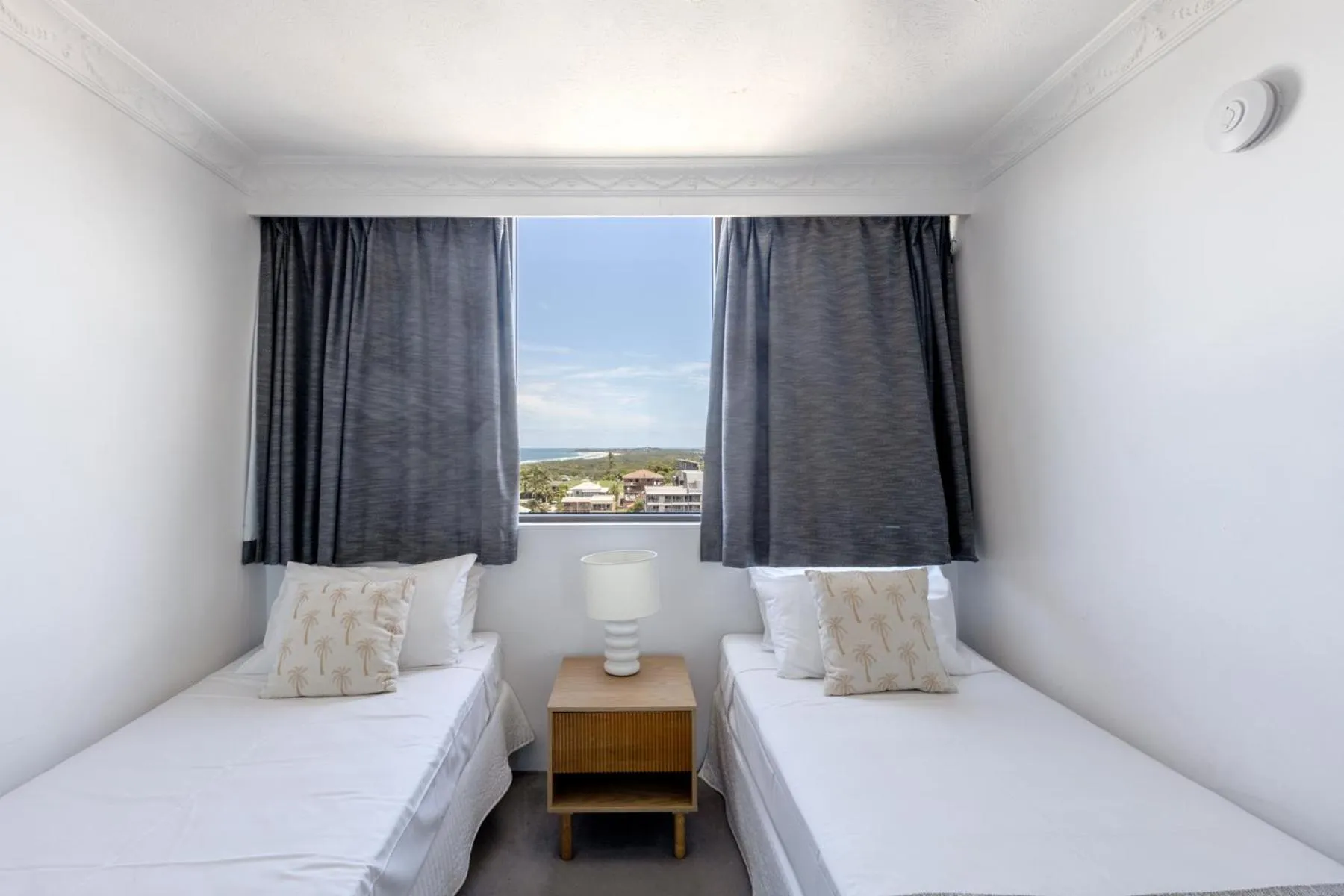 Bed in Columbia Beachfront Apartments on Rainbow Bay