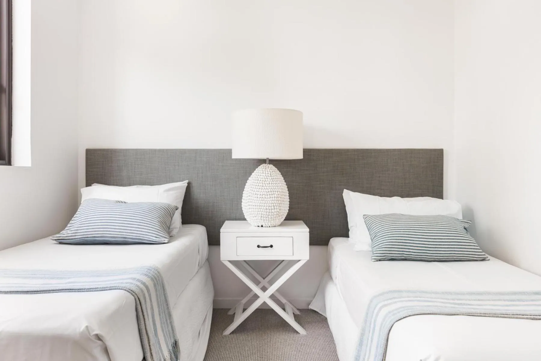 Bed in Columbia Beachfront Apartments on Rainbow Bay