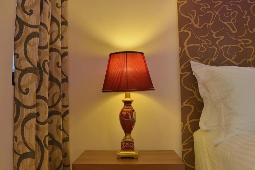 Bed in Turquoise Residence by UI