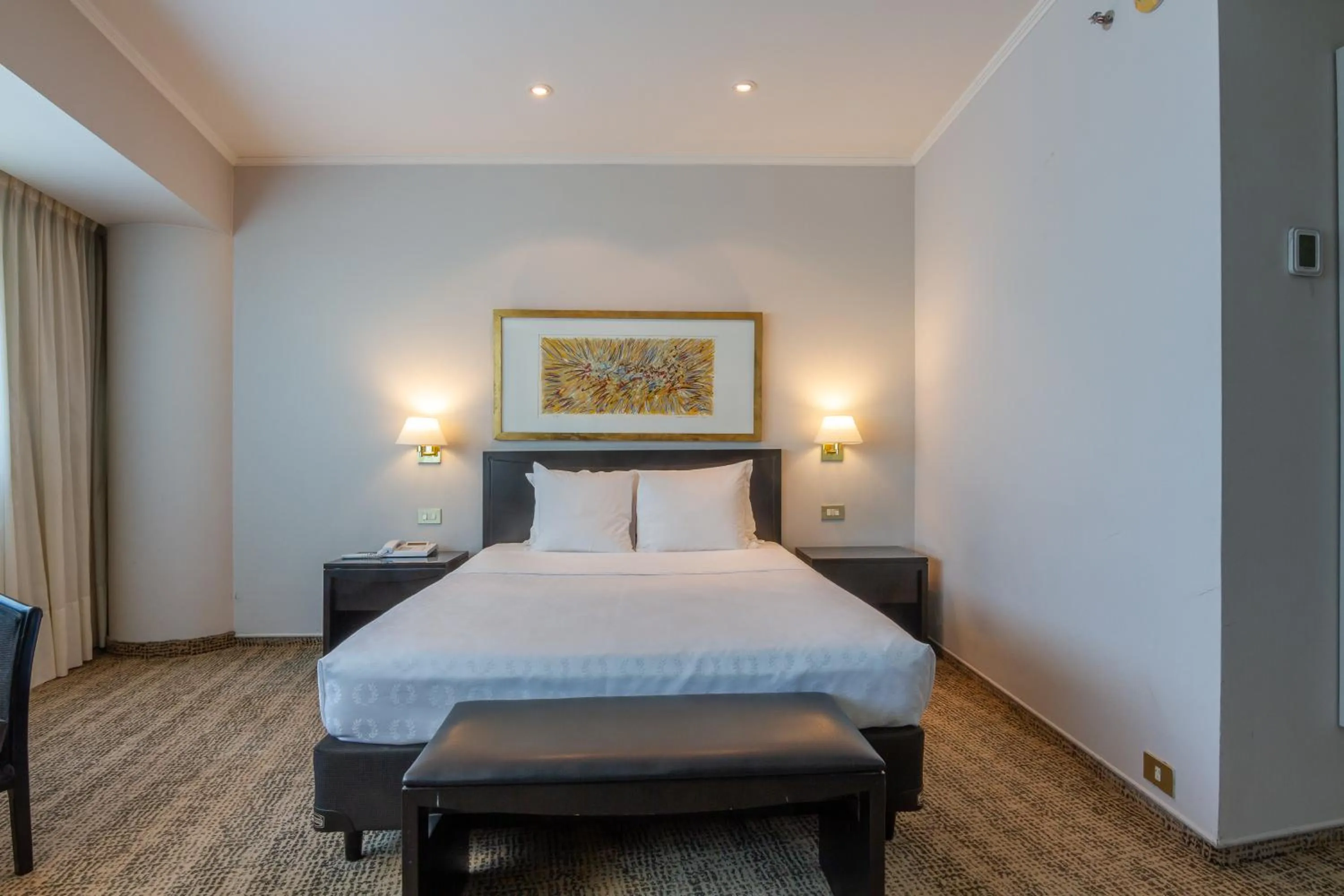 Bed in Quinto Centenario Hotel