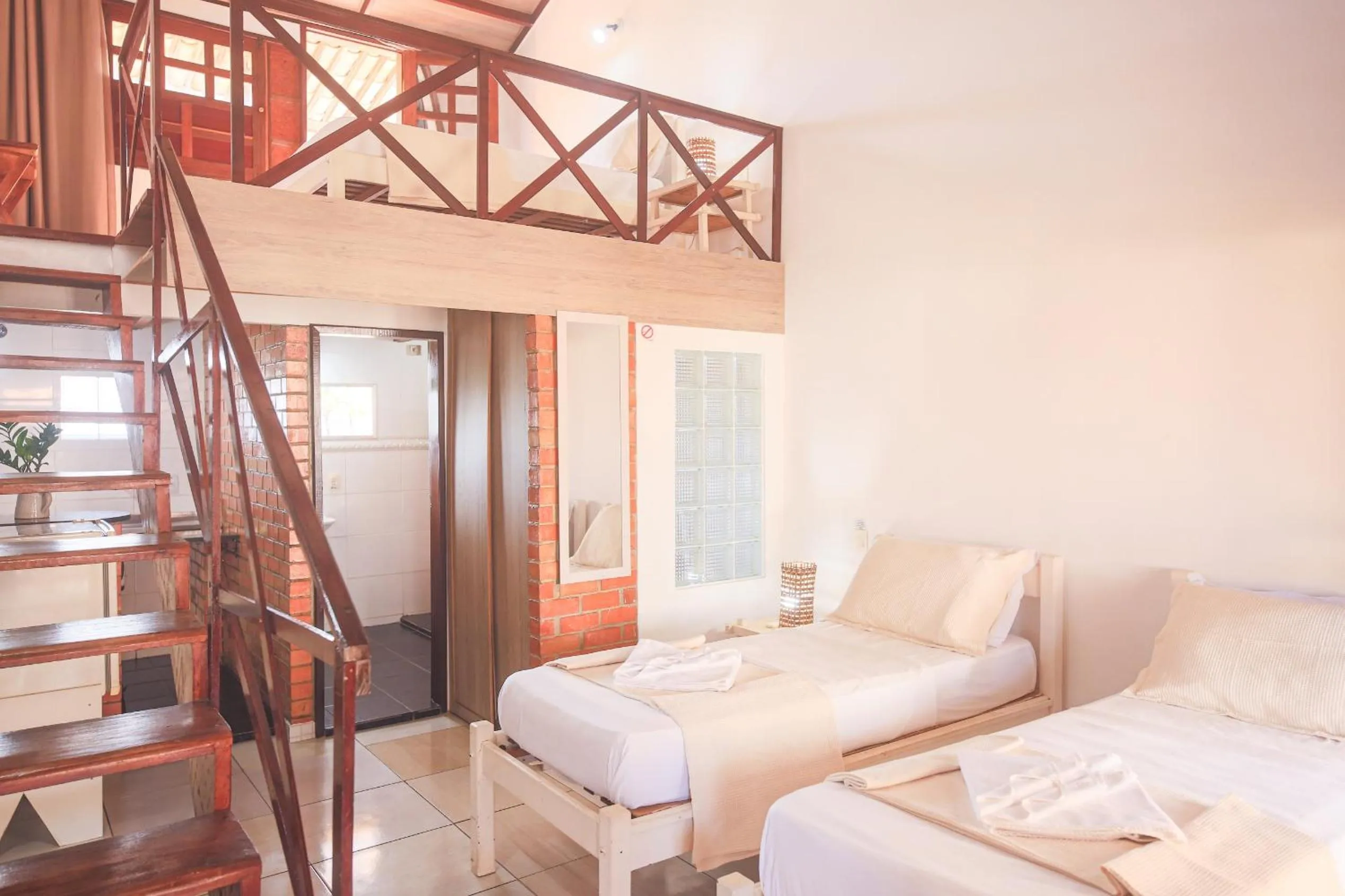 Bed in Pousada Bicho Preguiça