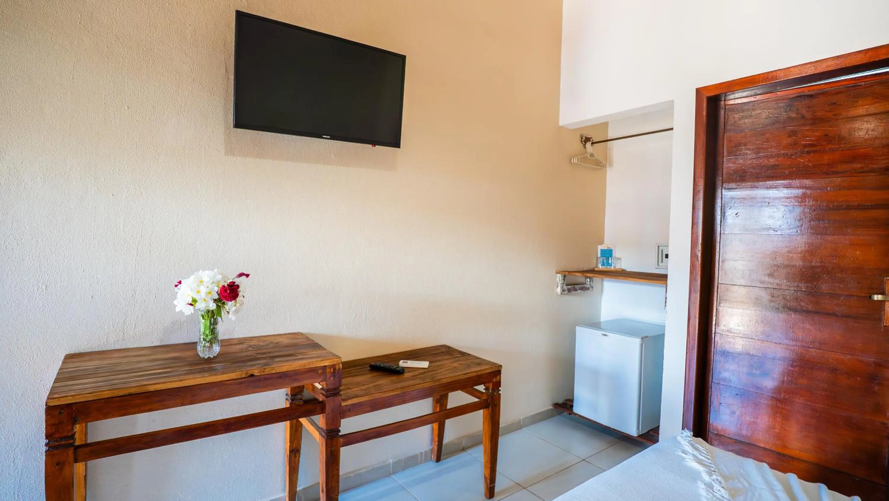 TV and multimedia in Pousada Bicho Preguiça