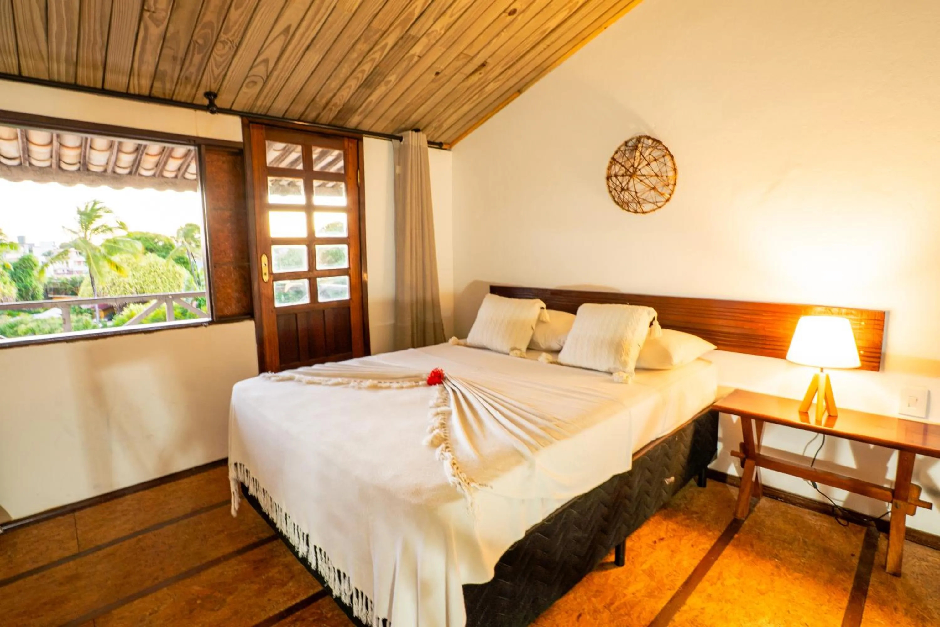 Bed in Pousada Bicho Preguiça