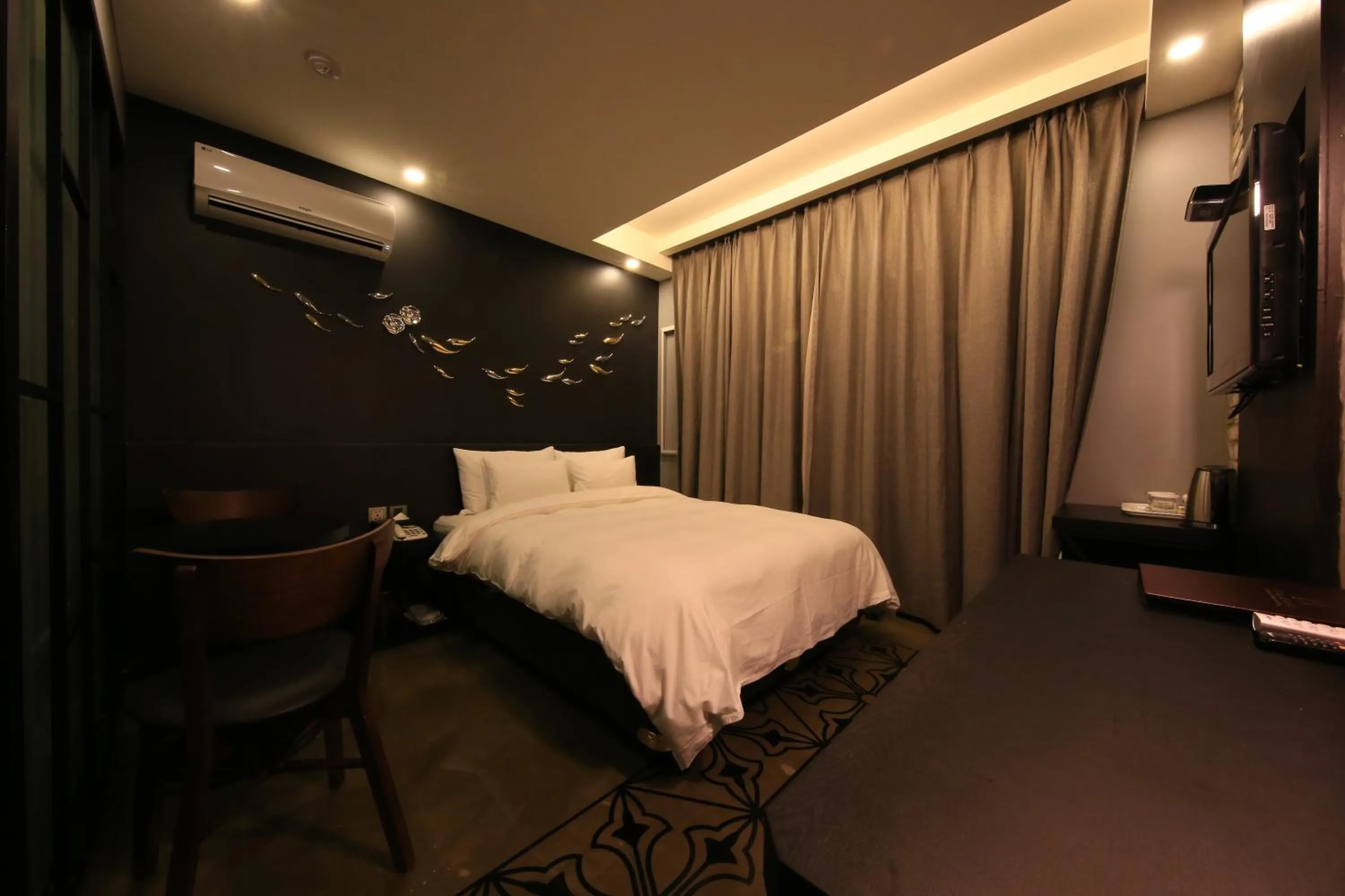 Bed in Kobos Hotel