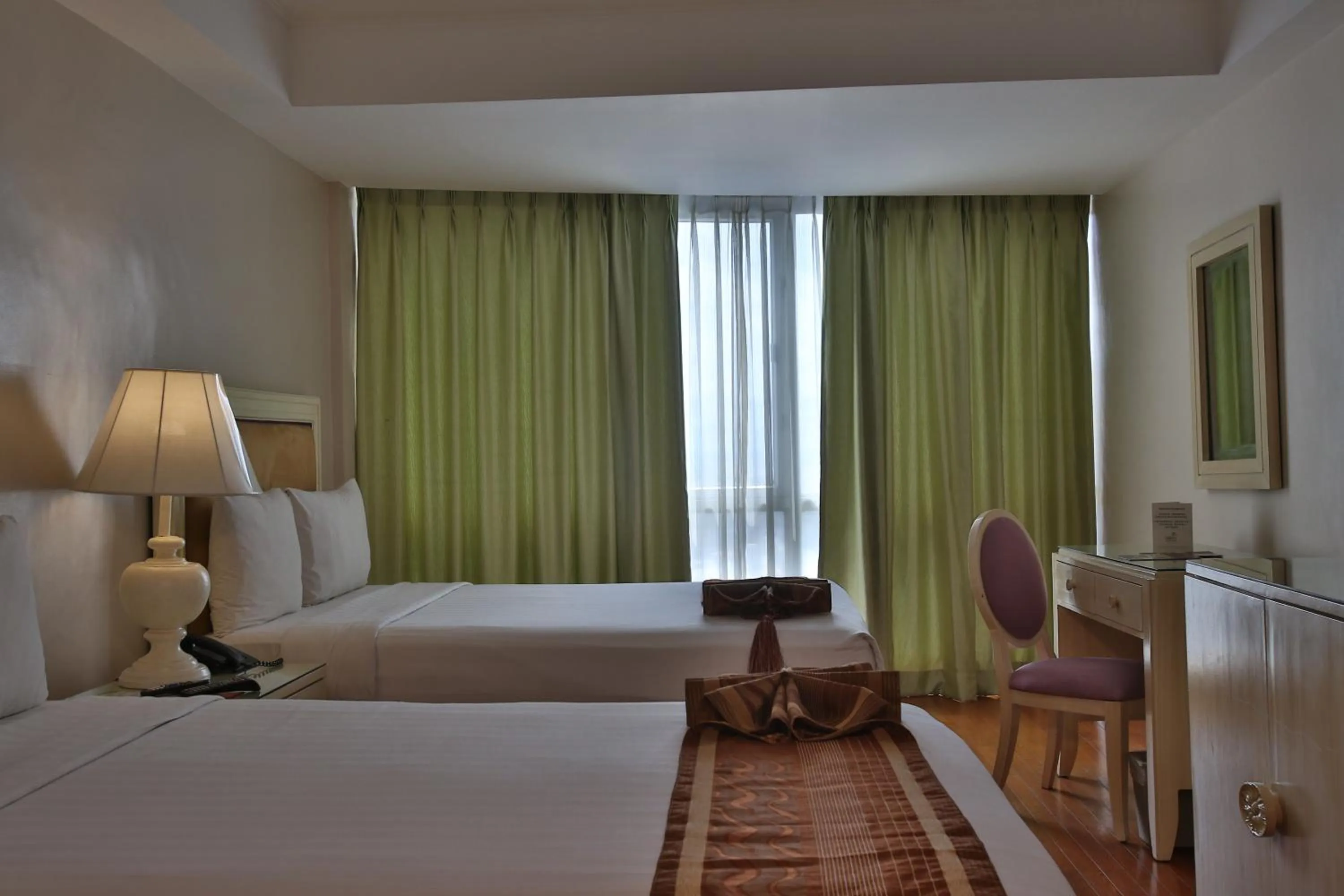 Photo of the whole room, Bed in Crown Regency Hotel & Towers