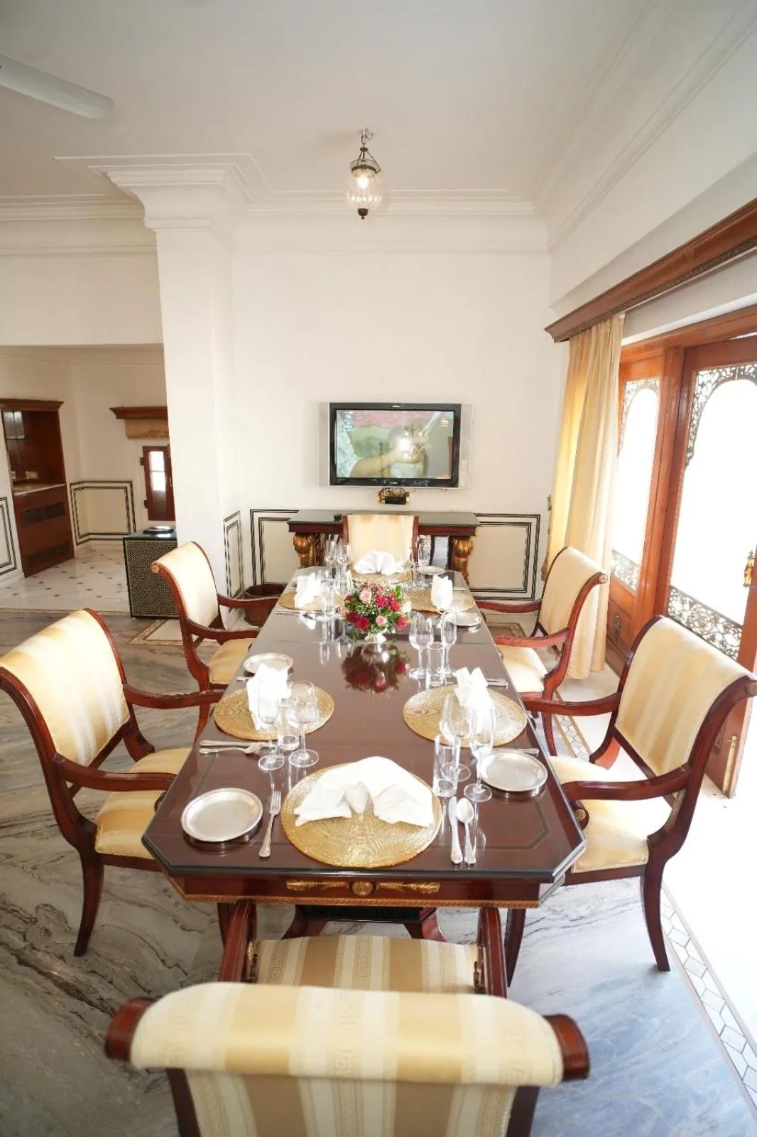 Communal lounge/ TV room in The Raj Palace (Small Luxury Hotels of the World)