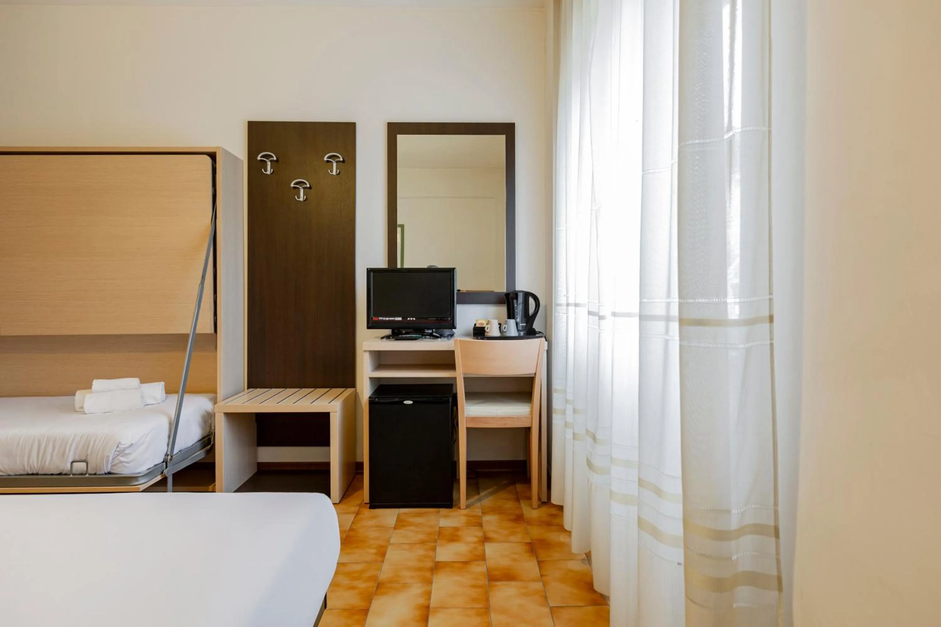 Communal lounge/ TV room in Catignano Hotel