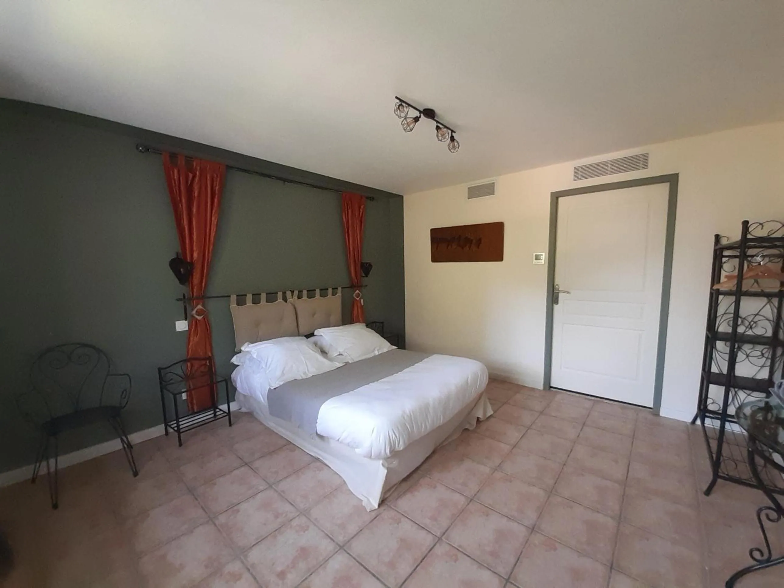 Photo of the whole room, Bed in Logis Domaine de Peyrolade