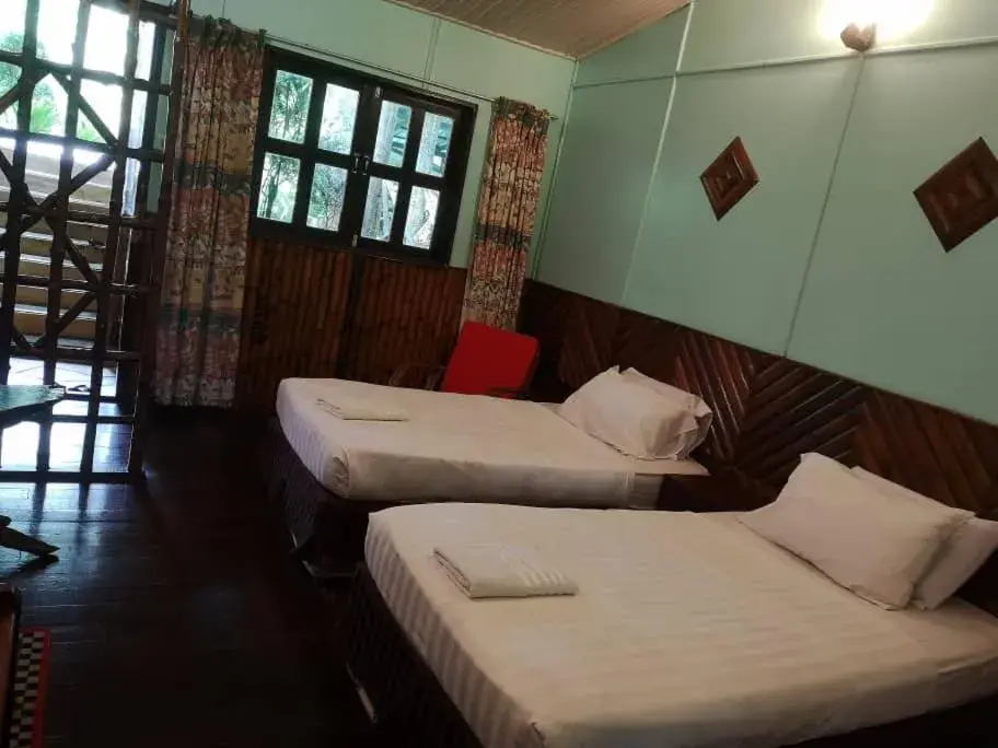 Bed in Sepilok Jungle Resort Bed in Sepilok Jungle Resort