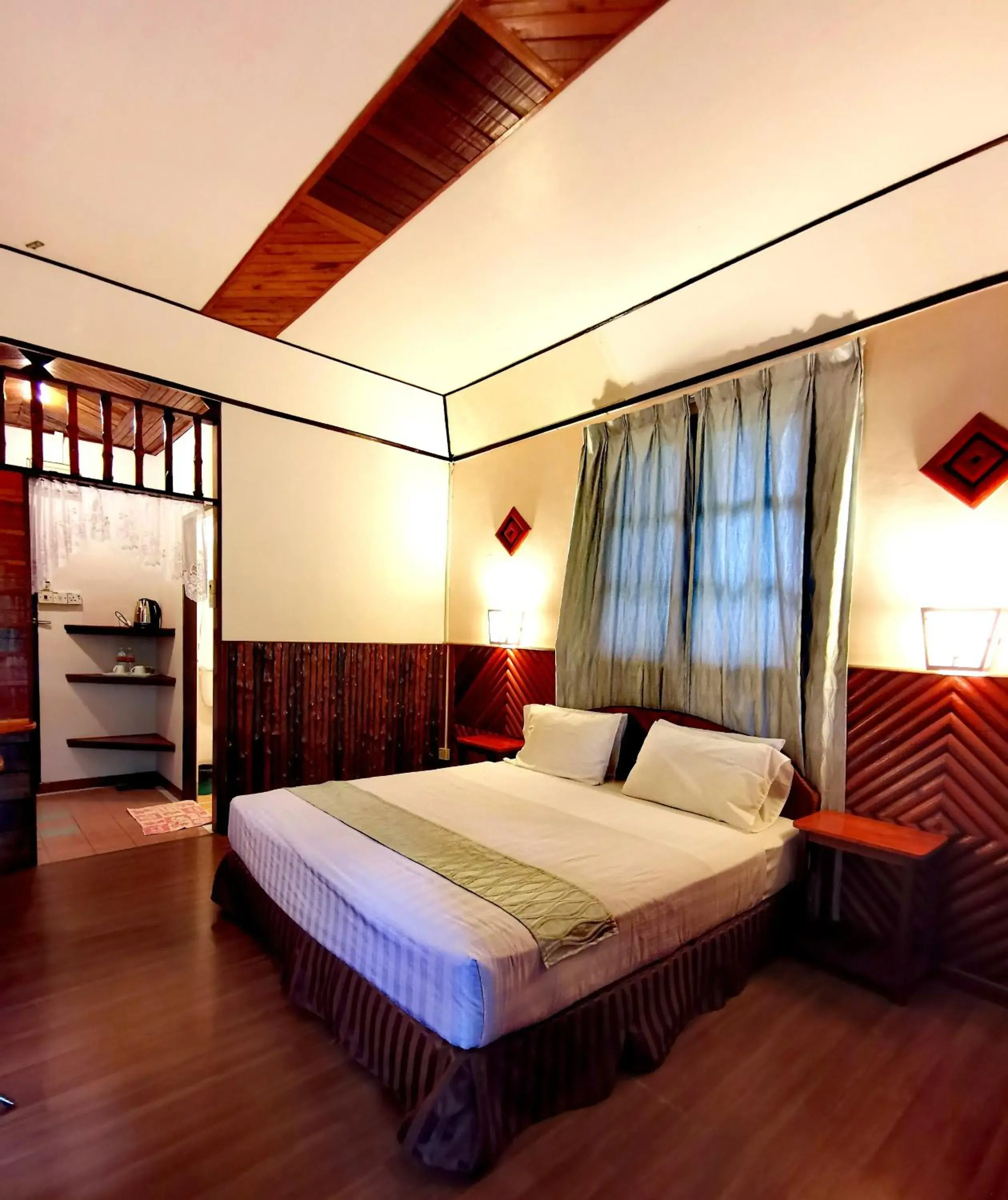 Bed in Sepilok Jungle Resort Bed in Sepilok Jungle Resort