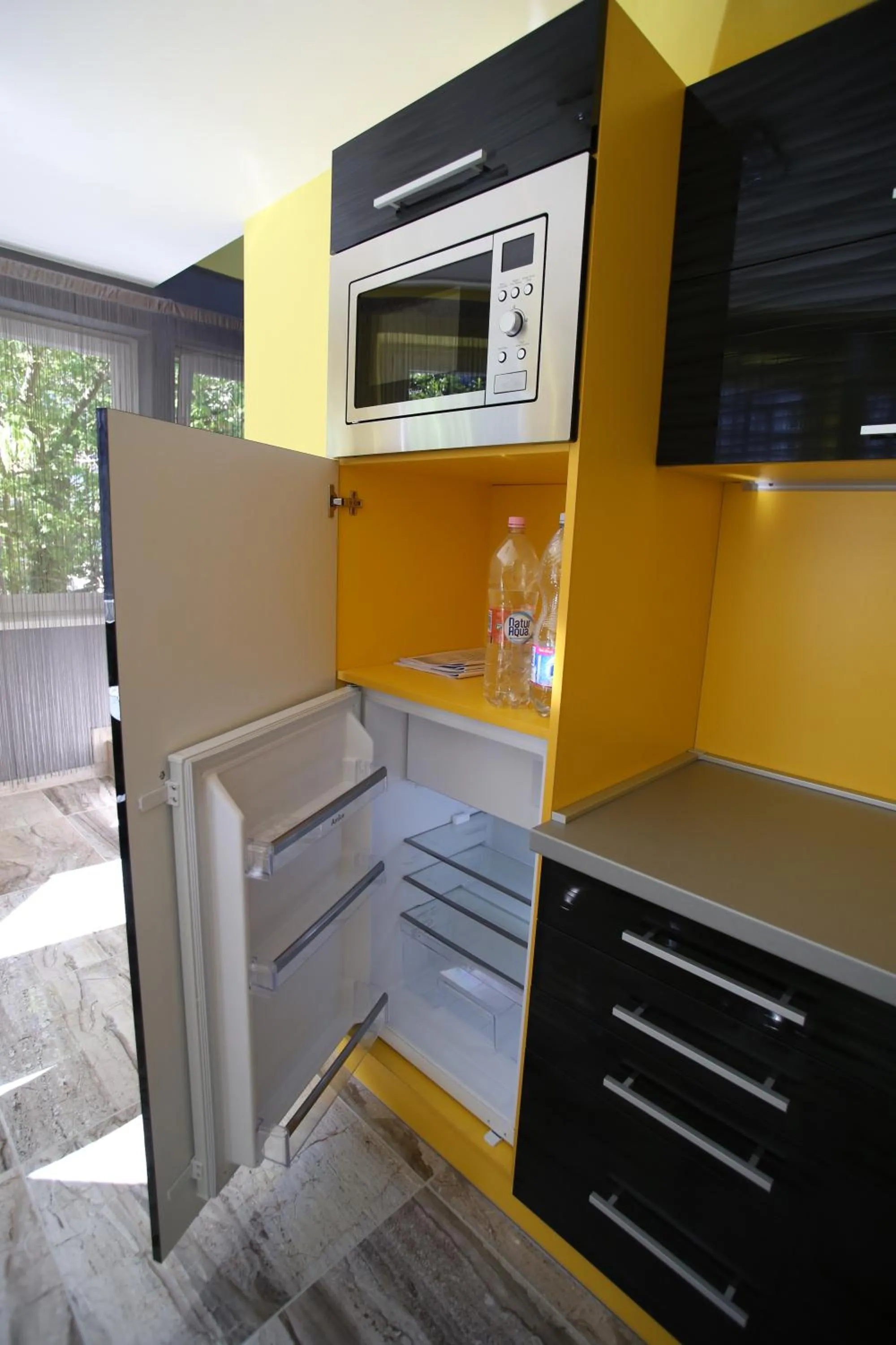 Kitchen or kitchenette in Centrum Lux Apartman