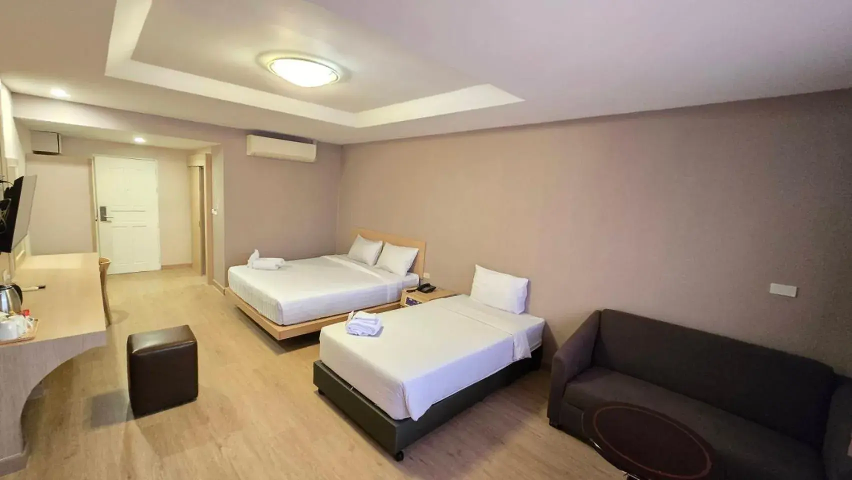 Seating area, Bed in Grand Tara Garden Thai Hotel Seating area, Bed in Grand Tara Garden Thai Hotel