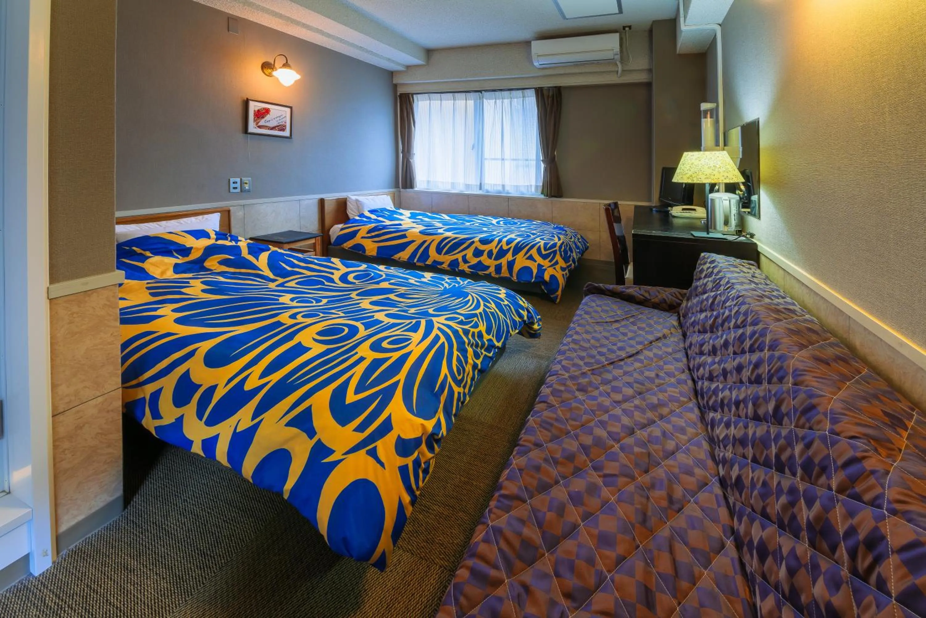 Bedroom, Bed in Kyoto Travellers Inn