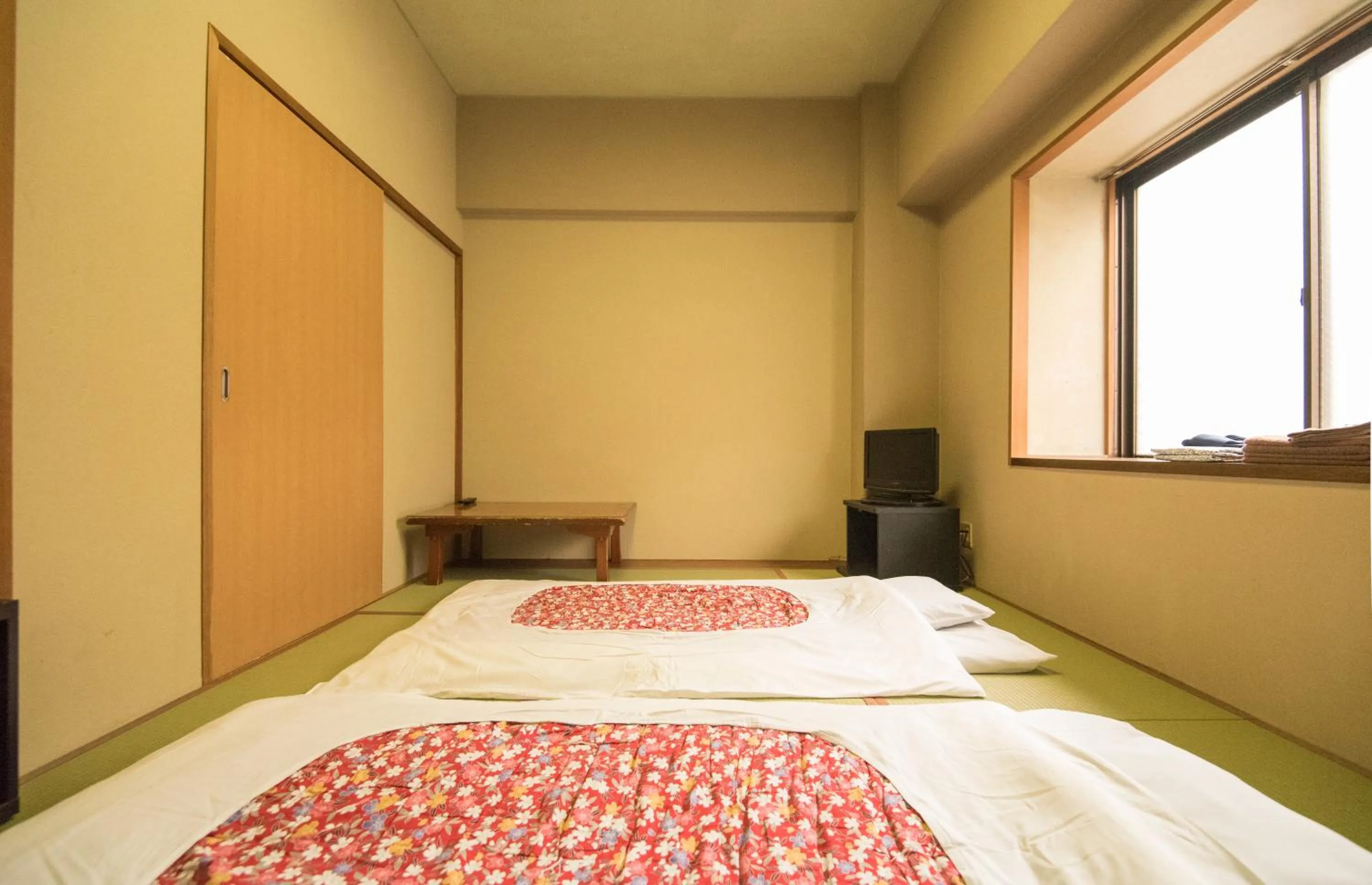 Bedroom, Bed in Kyoto Travellers Inn