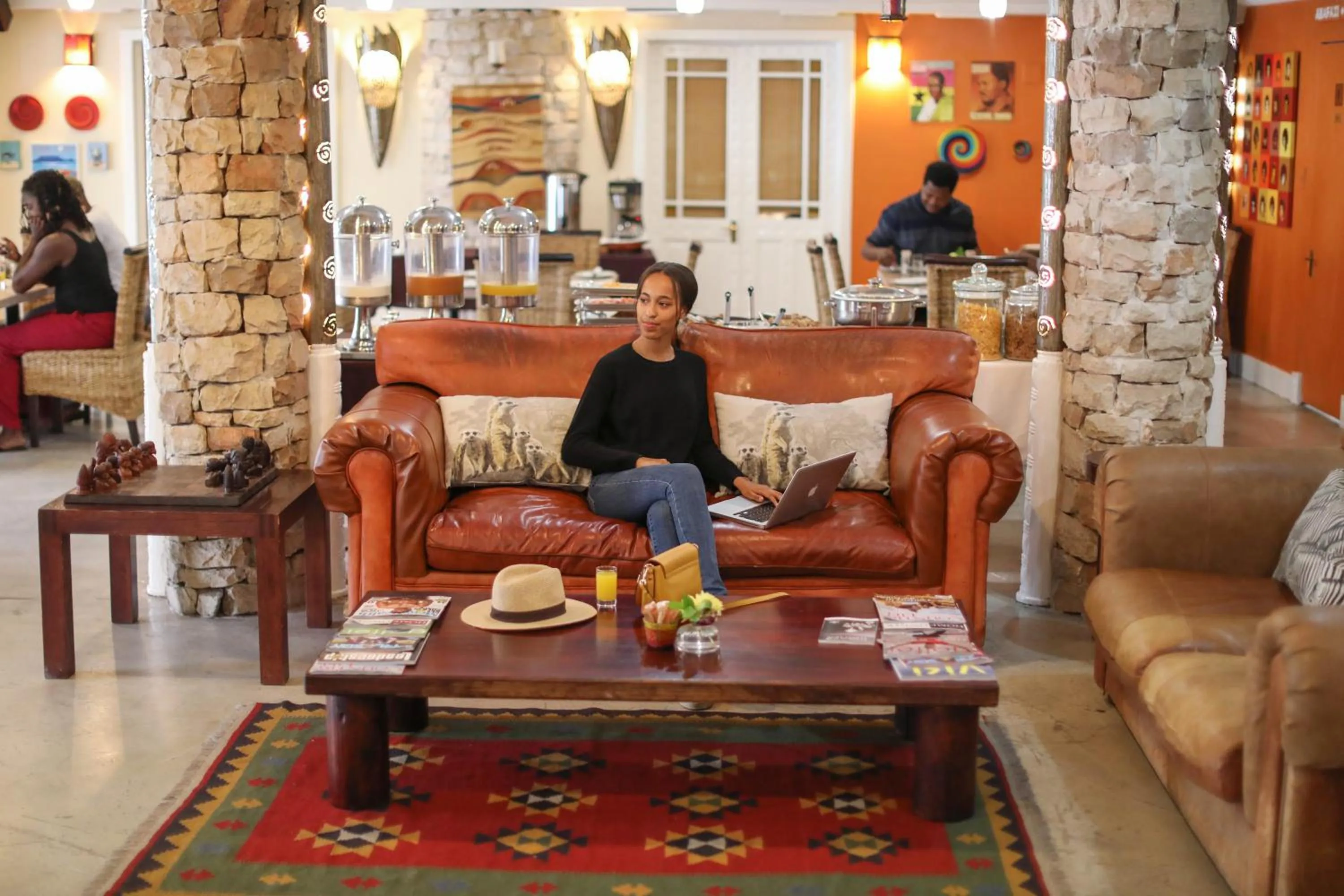 Communal lounge/ TV room in iKhaya Boutique Hotel