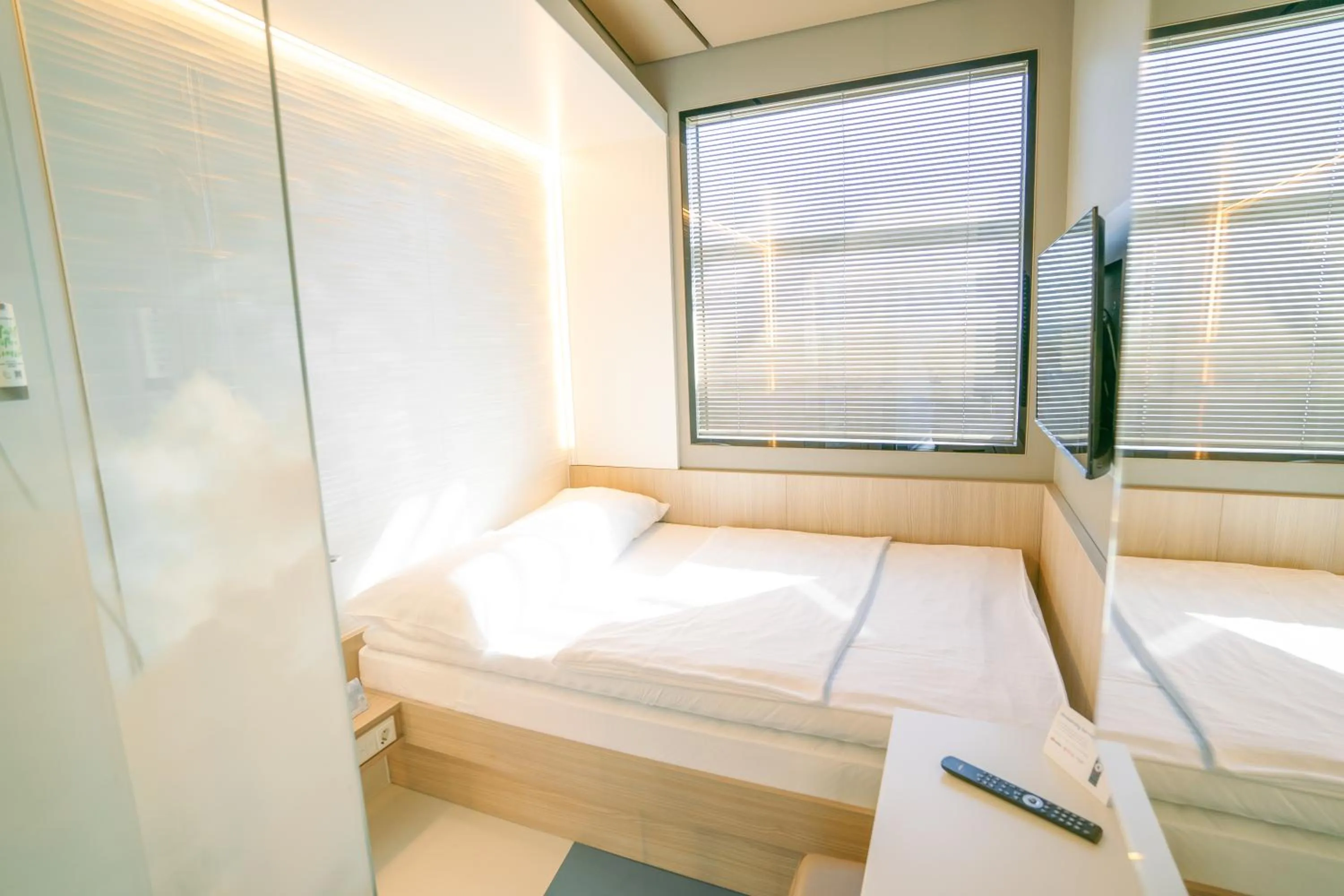 Photo of the whole room, Bed in MY CLOUD Transit Hotel - Guests with international flight only!