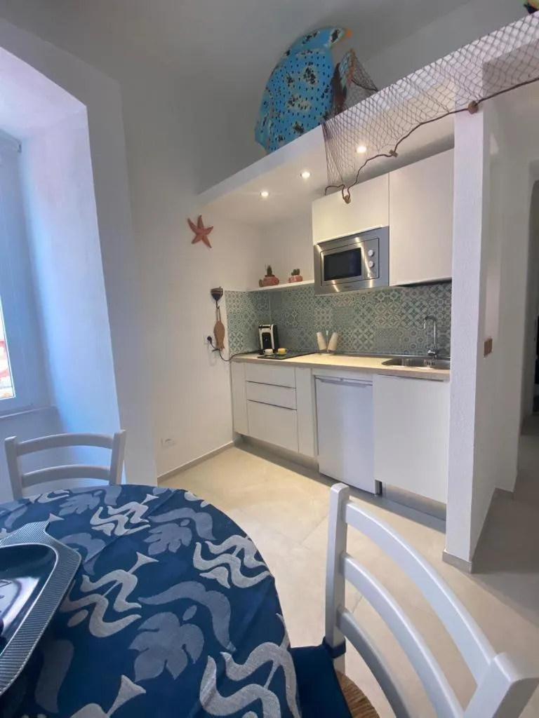 Kitchen or kitchenette in Trame - La Naca sul Porto