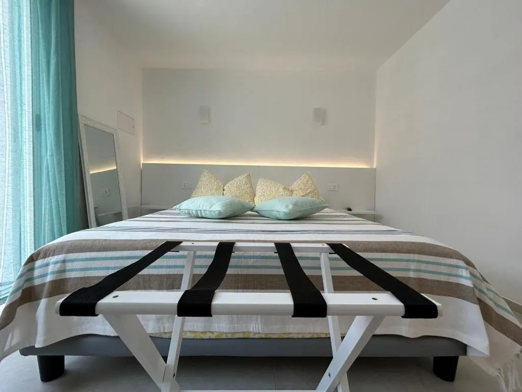 Photo of the whole room, Bed in Trame - La Naca sul Porto