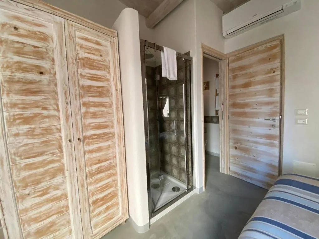 Photo of the whole room, Bed in Trame - La Naca sul Porto