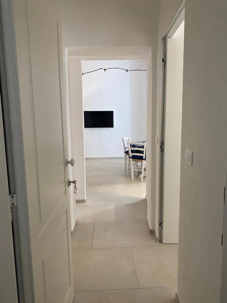 Facade/entrance in Trame - La Naca sul Porto
