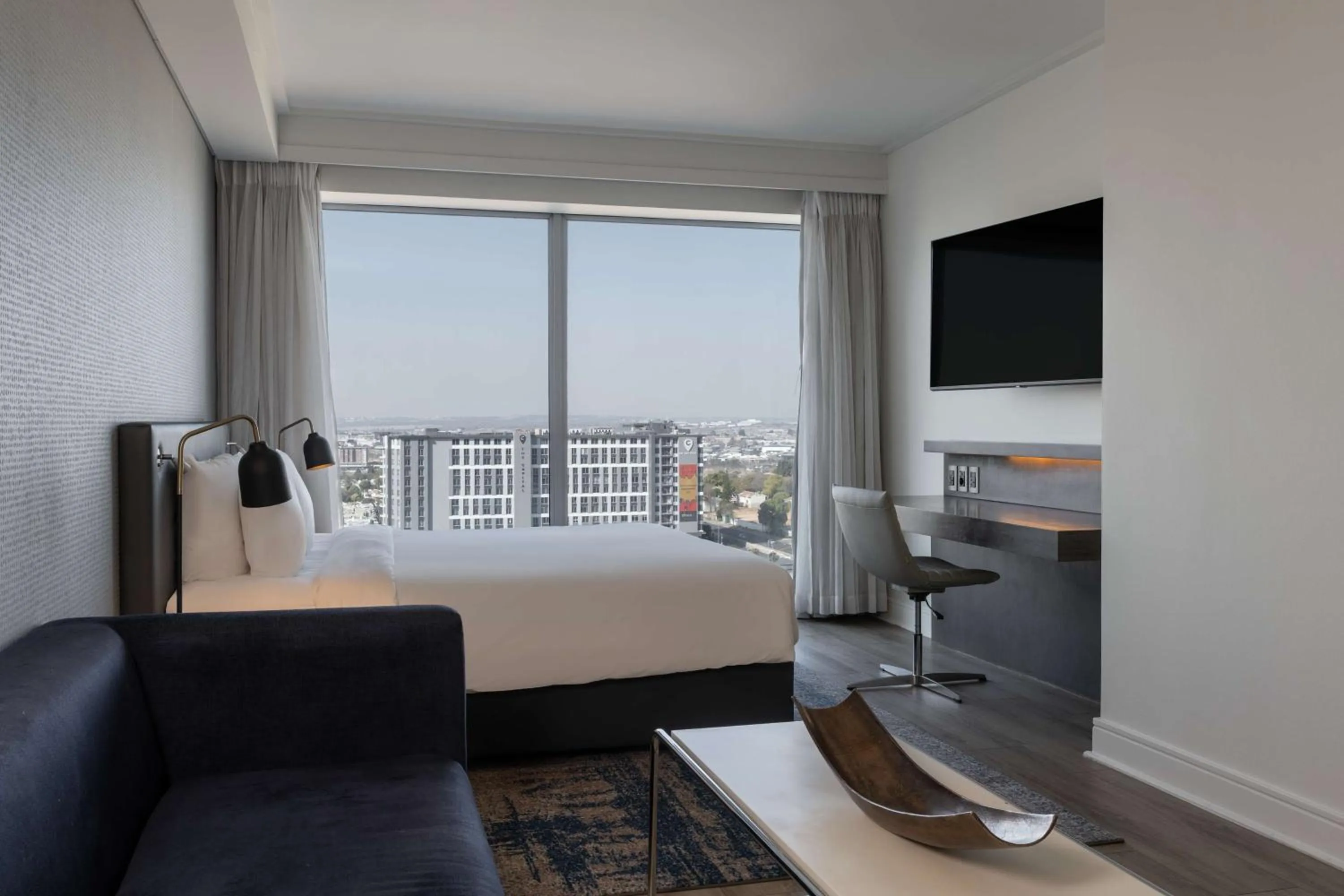 Photo of the whole room, Bed in Radisson Blu Gautrain Hotel, Sandton Johannesburg