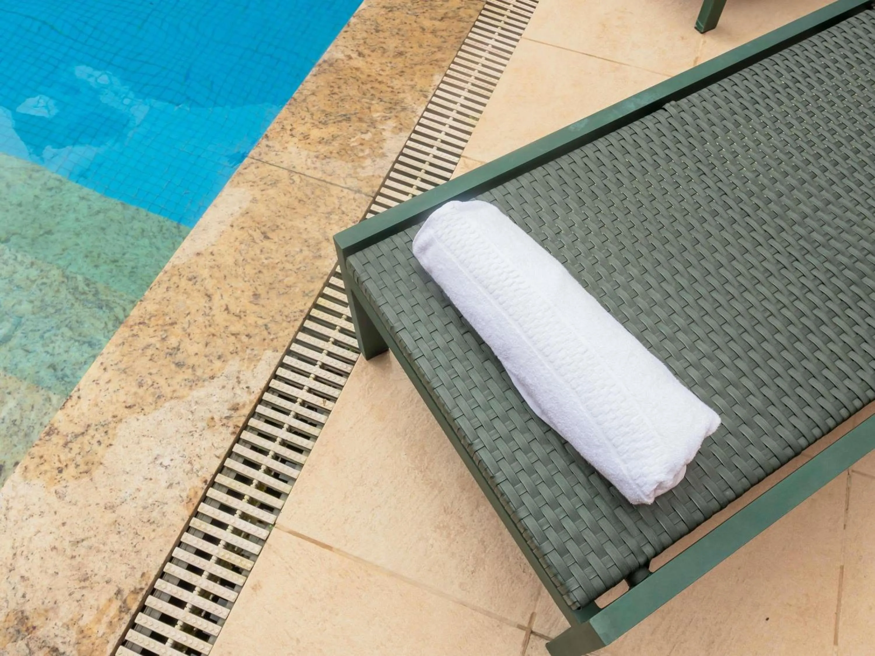 Pool view in ibis Styles Belem Nazare