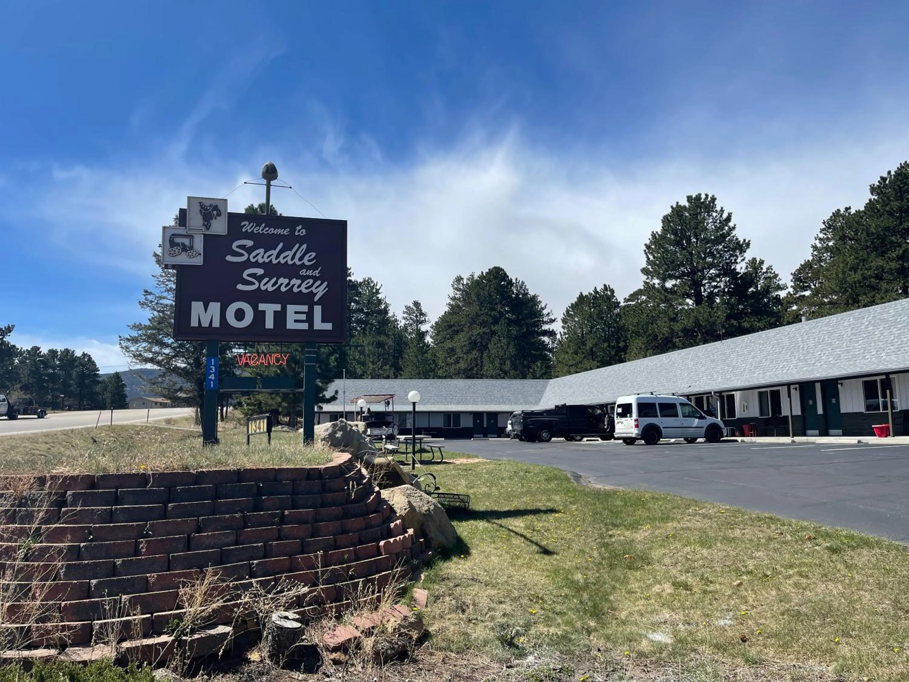 Property building in Saddle & Surrey Motel