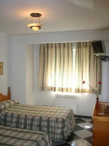 Photo of the whole room, Bed in Hotel Guillermo II
