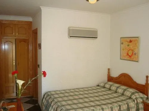 Photo of the whole room, Bed in Hotel Guillermo II