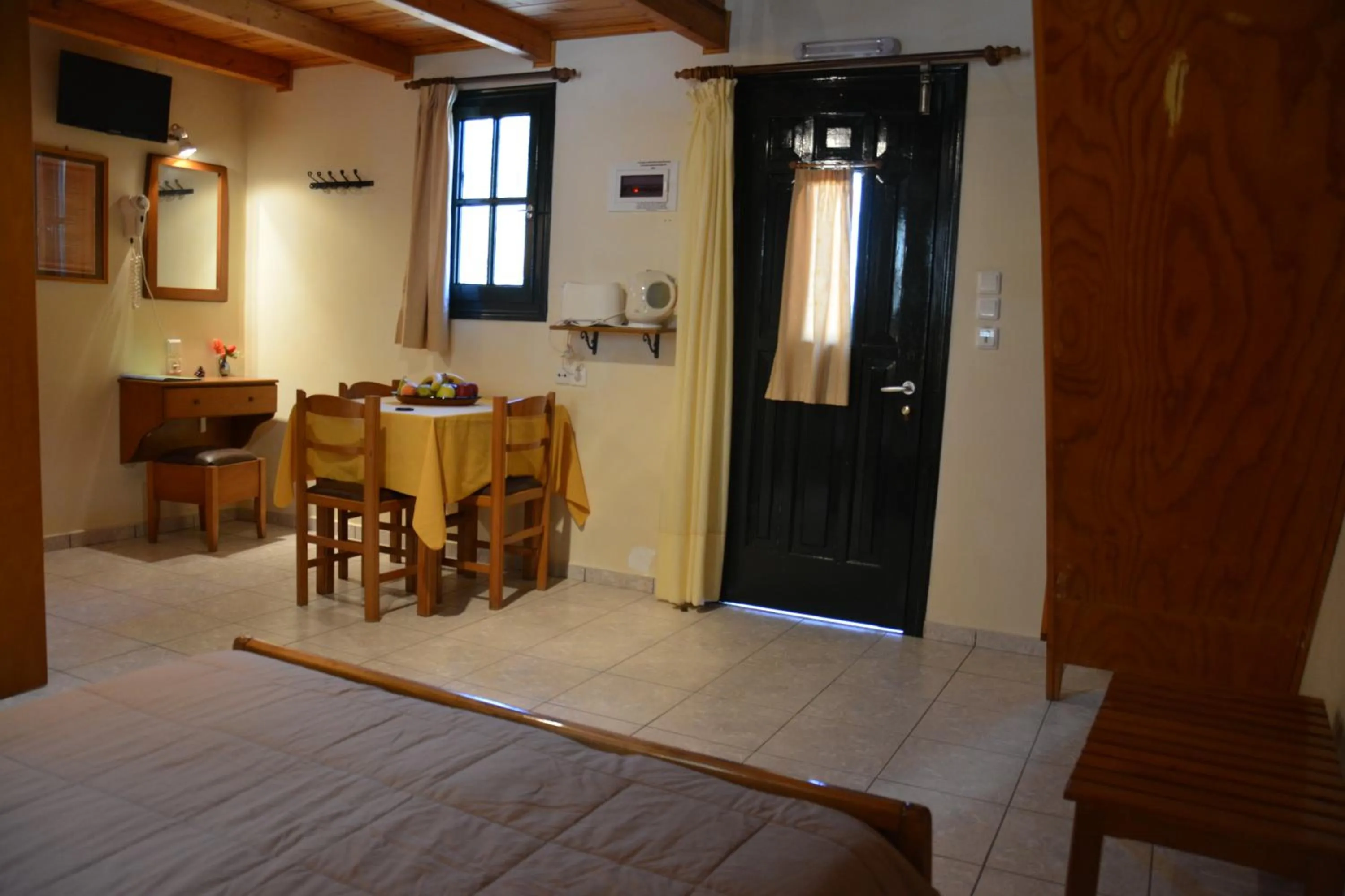Dining area, Bed in Aristotelis Apartments