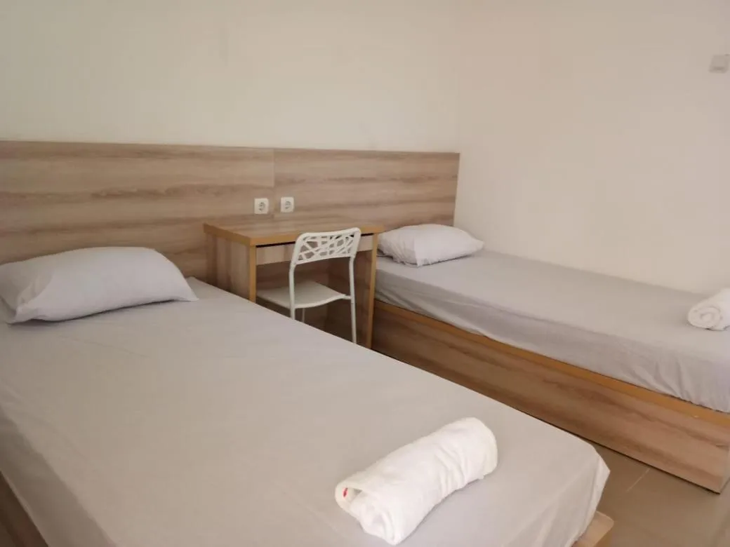 Bed in Wika Bali Beach House