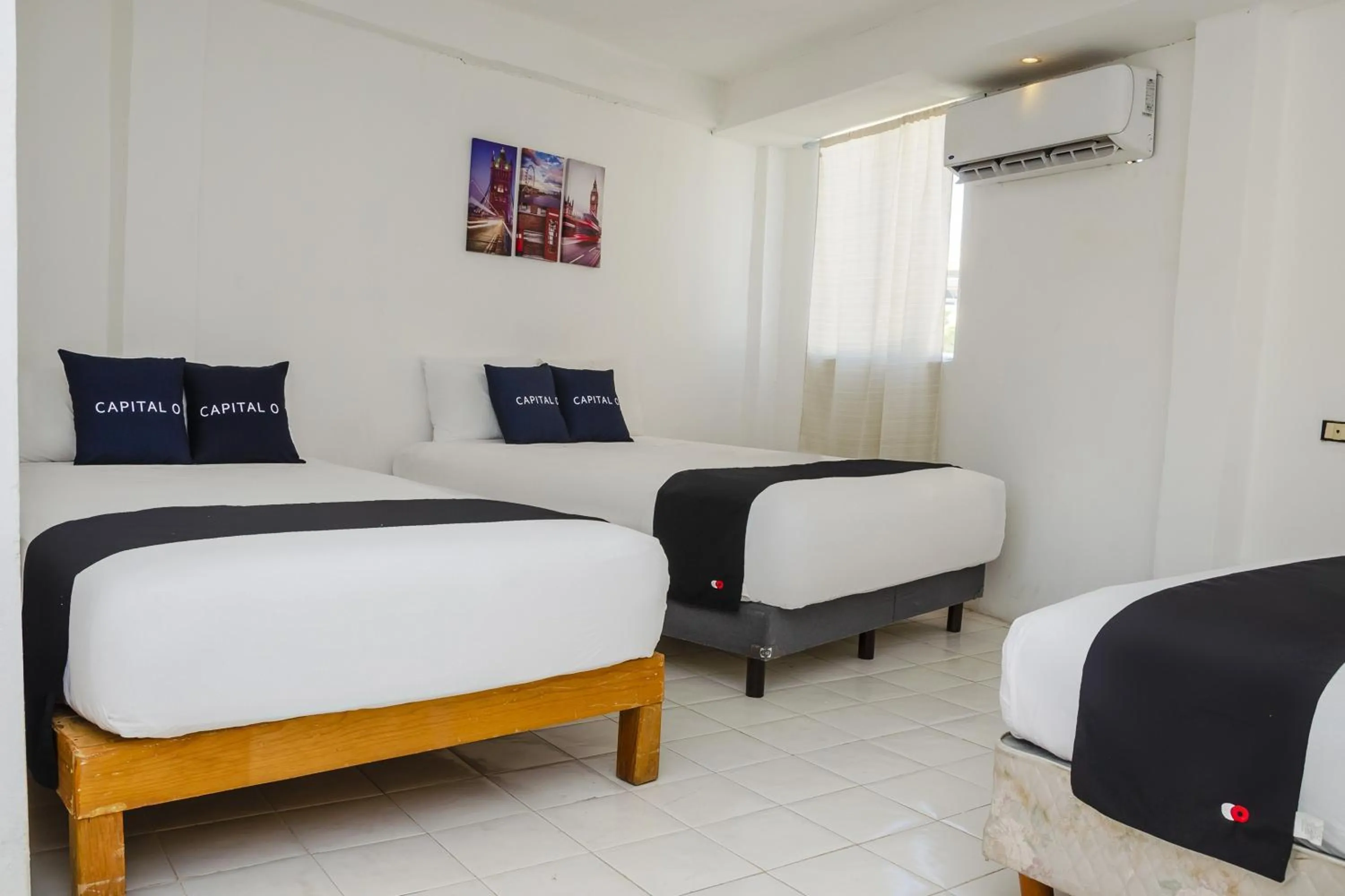 Bedroom, Bed in Capital O Hotel Dos Mares, Cabo San Lucas