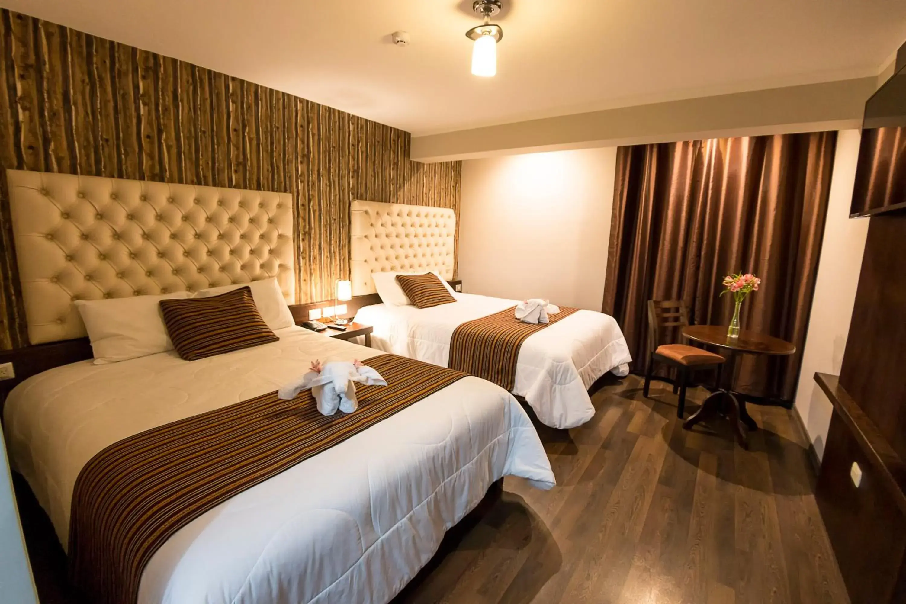 City view, Bed in Ureta Hotel City view, Bed in Ureta Hotel