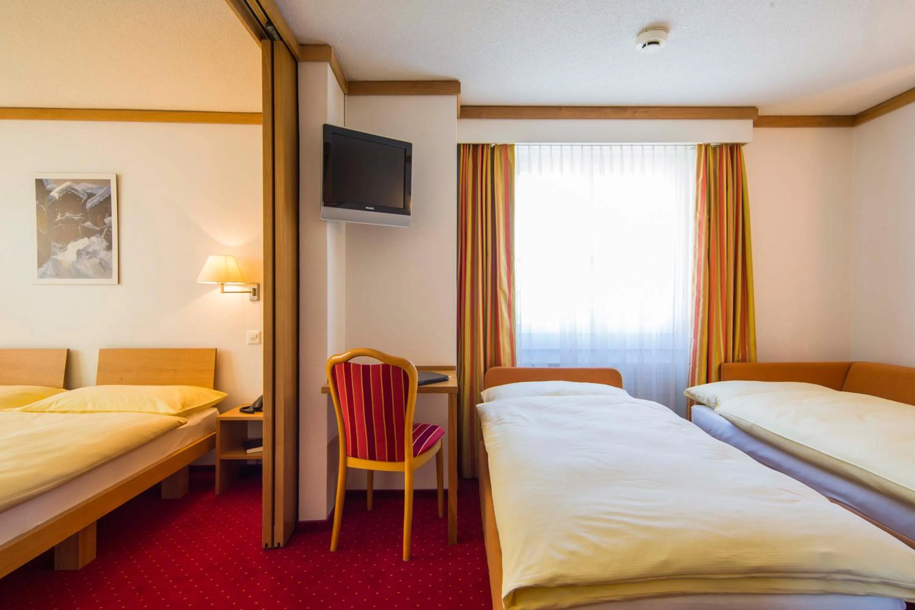 Bed in Hotel Excelsior