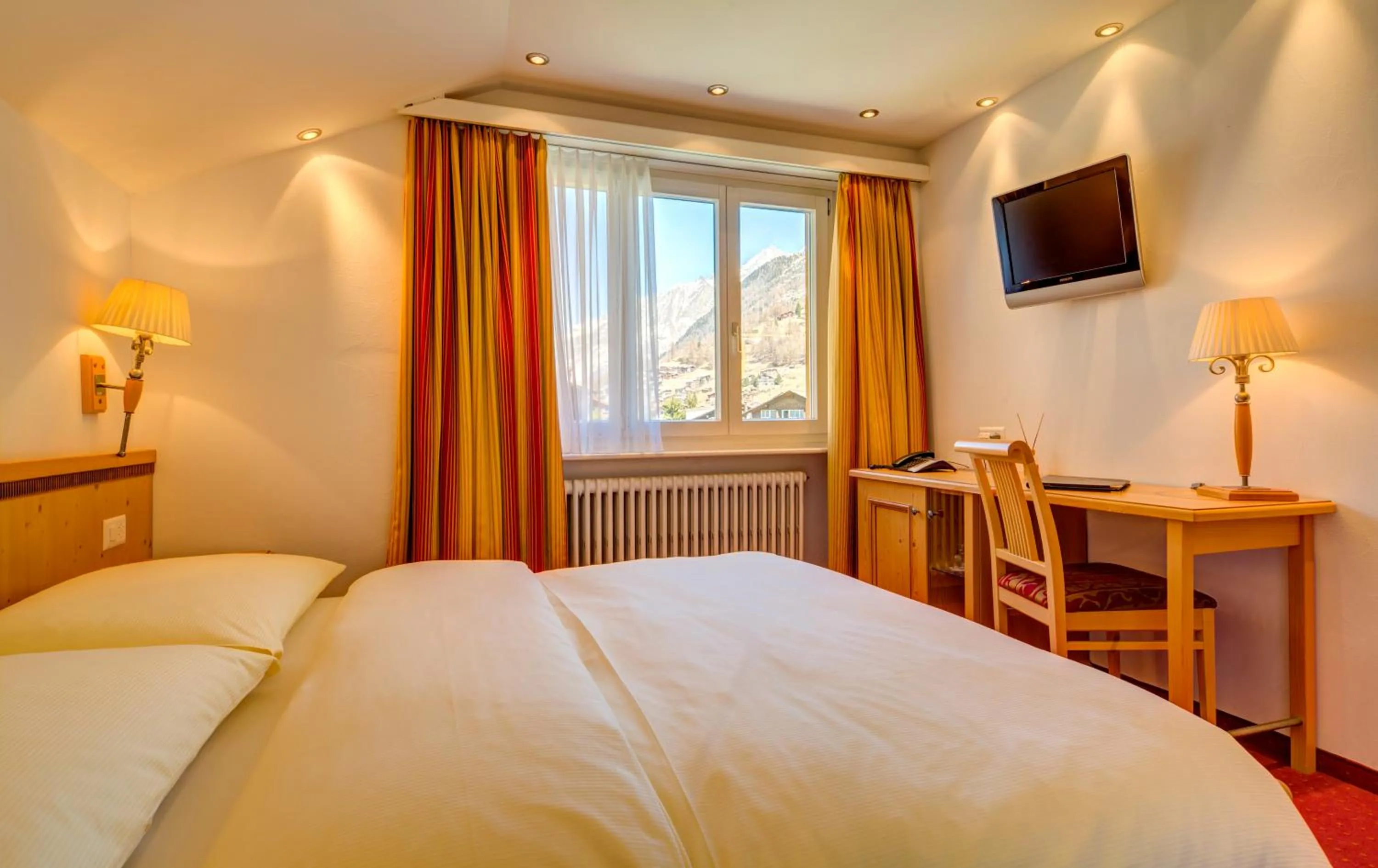 Bed in Hotel Excelsior