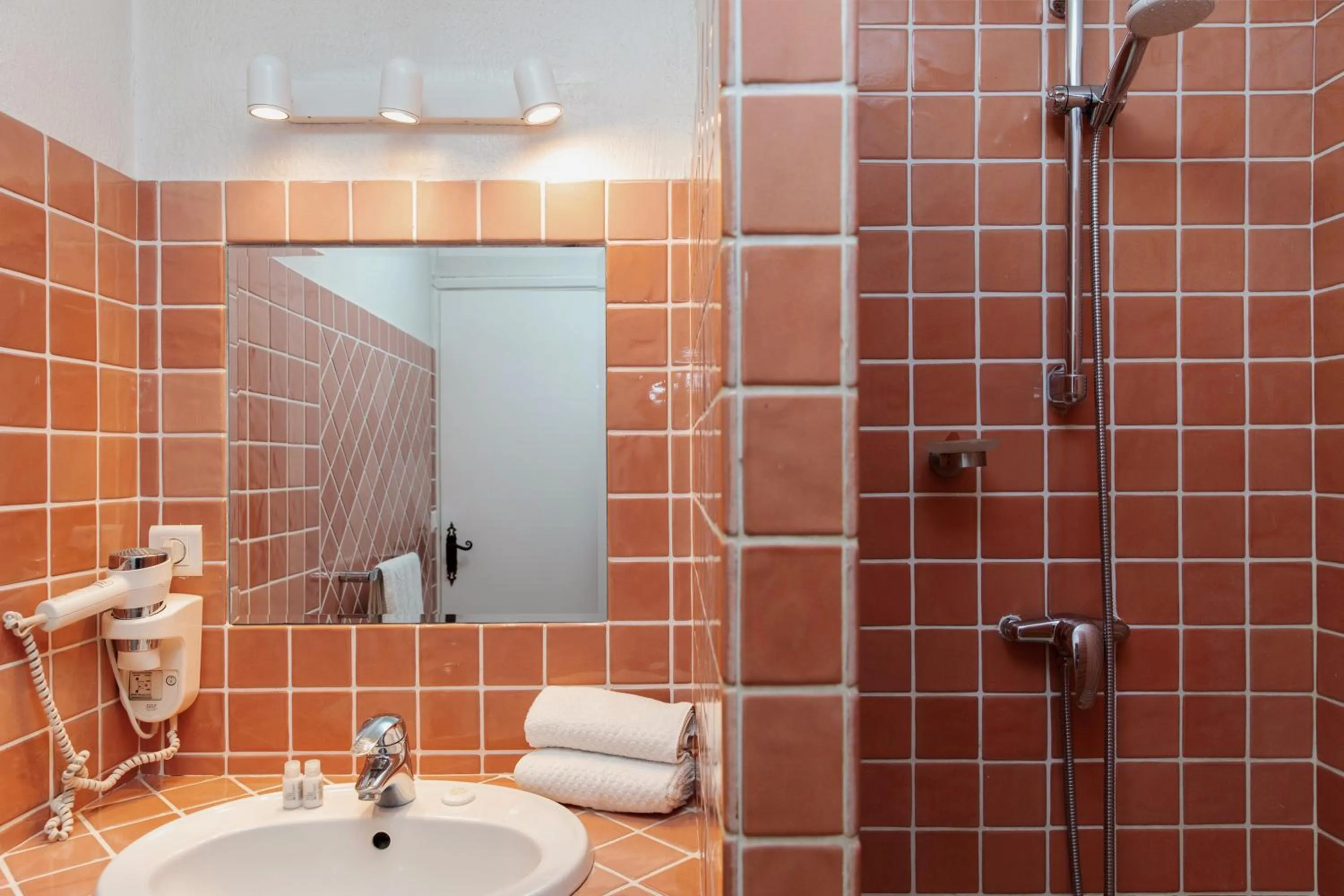 Bathroom in Coq Hotel