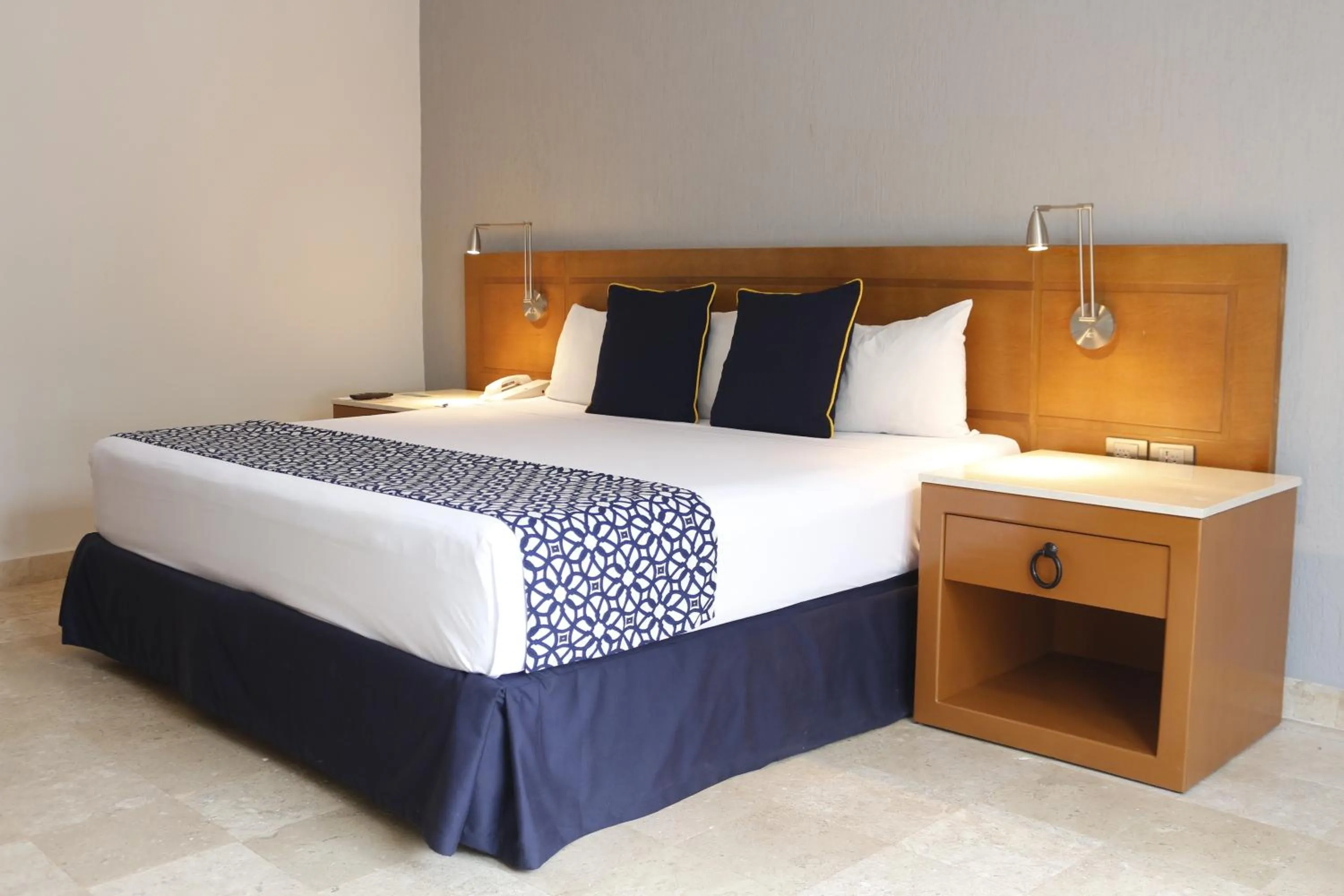 Bed in Plaza Pelicanos Club Beach Resort All Inclusive