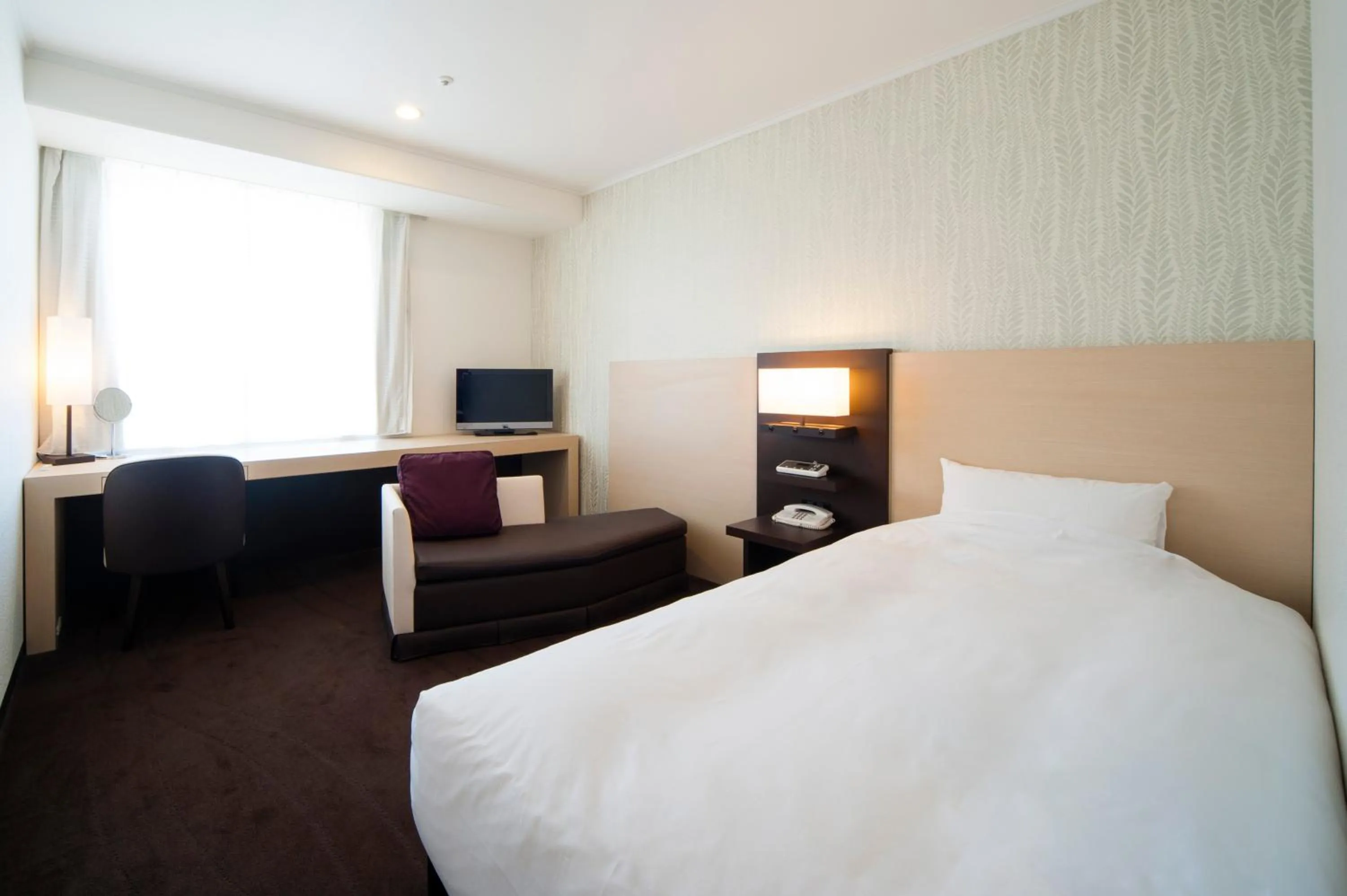 Bed in Hotel Granvia Osaka-JR Hotel Group