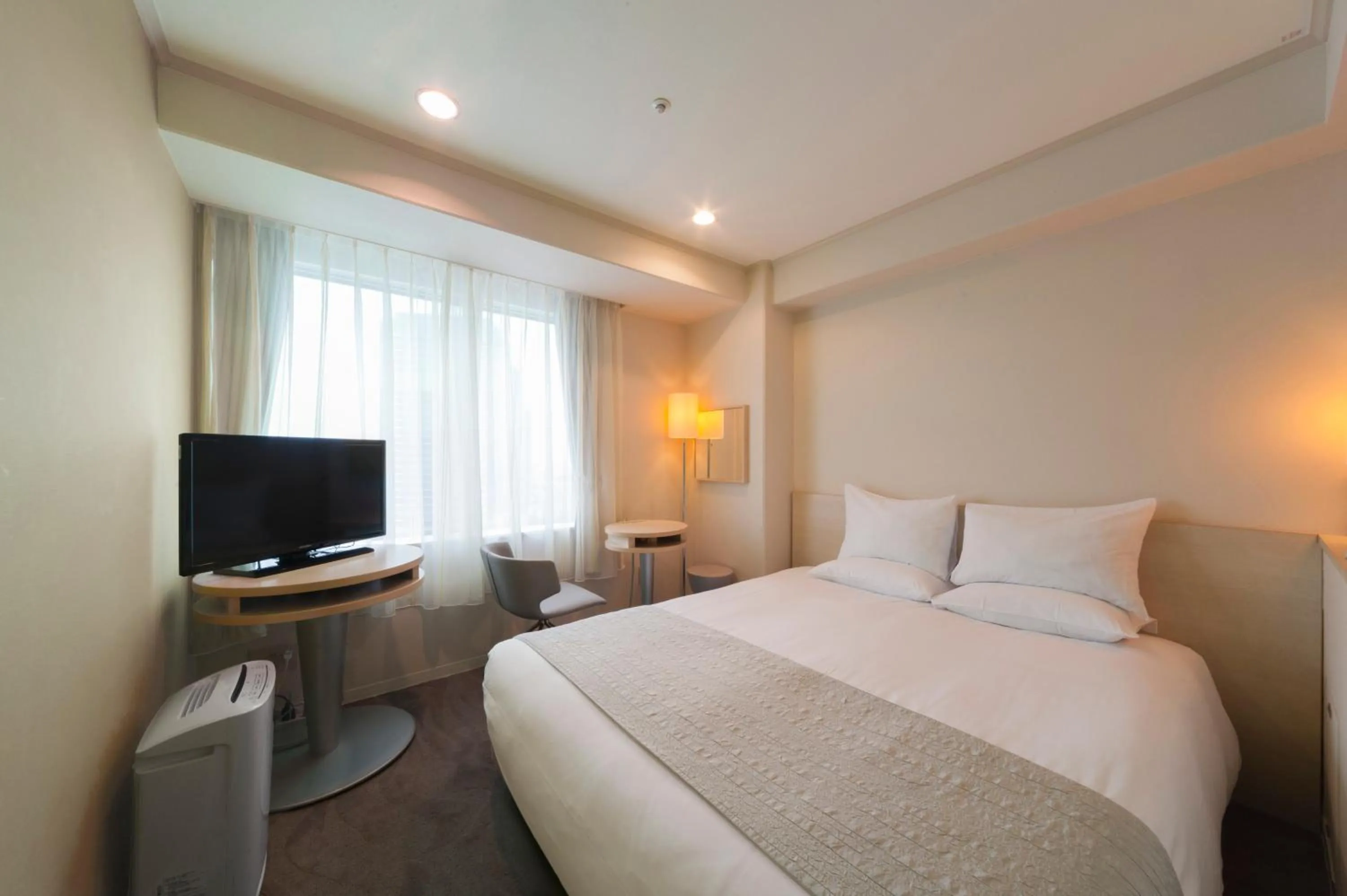 Bed in Hotel Granvia Osaka-JR Hotel Group